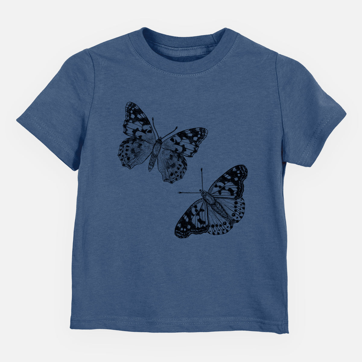 Indigo blue toddler t-shirt laid flat, printed with a detailed black ink illustration of two painted lady butterflies.
