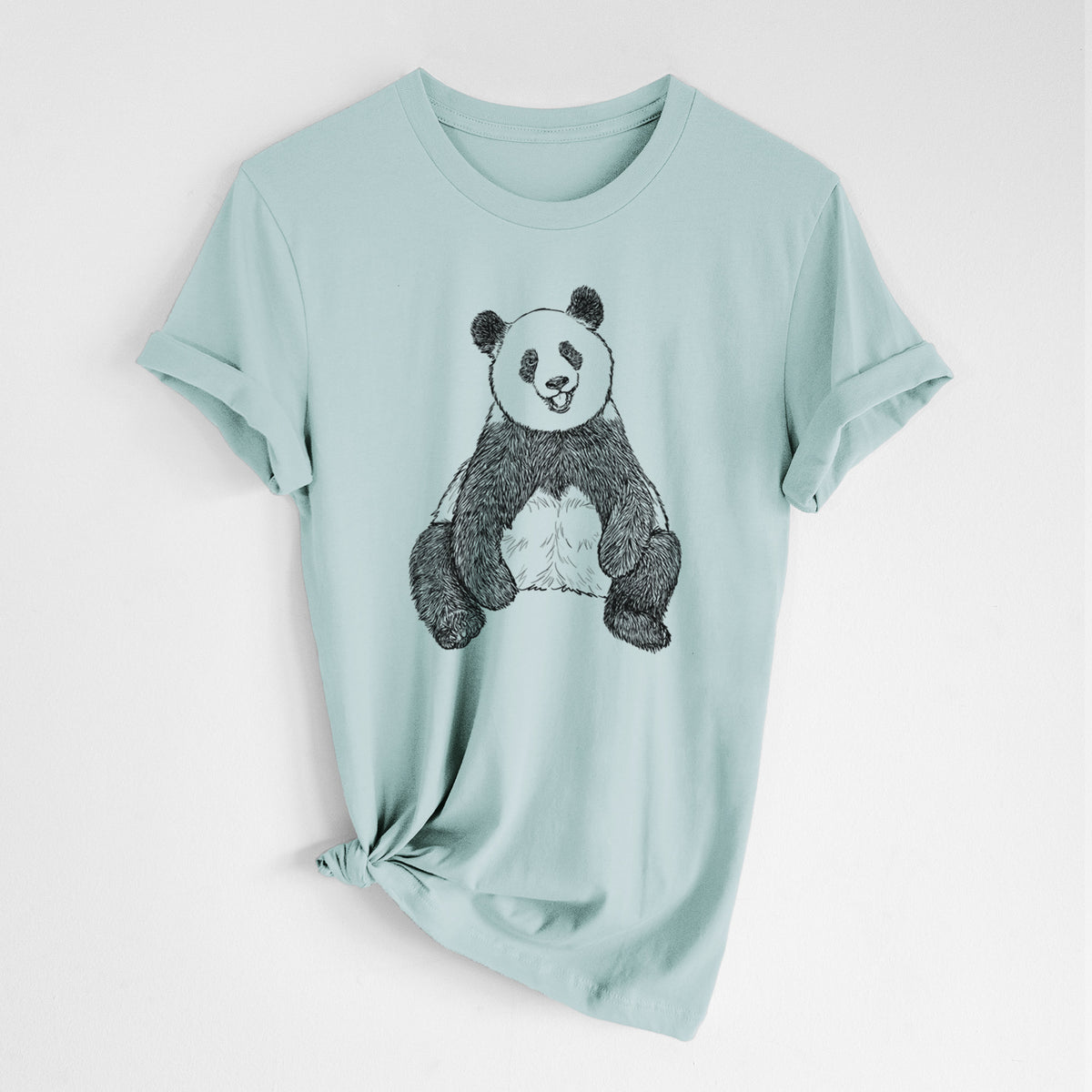 Dusty blue lightweight cotton t-shirt laid flat with the sleeves rolled, printed with a black ink illustration of a giant panda sitting and facing forward.