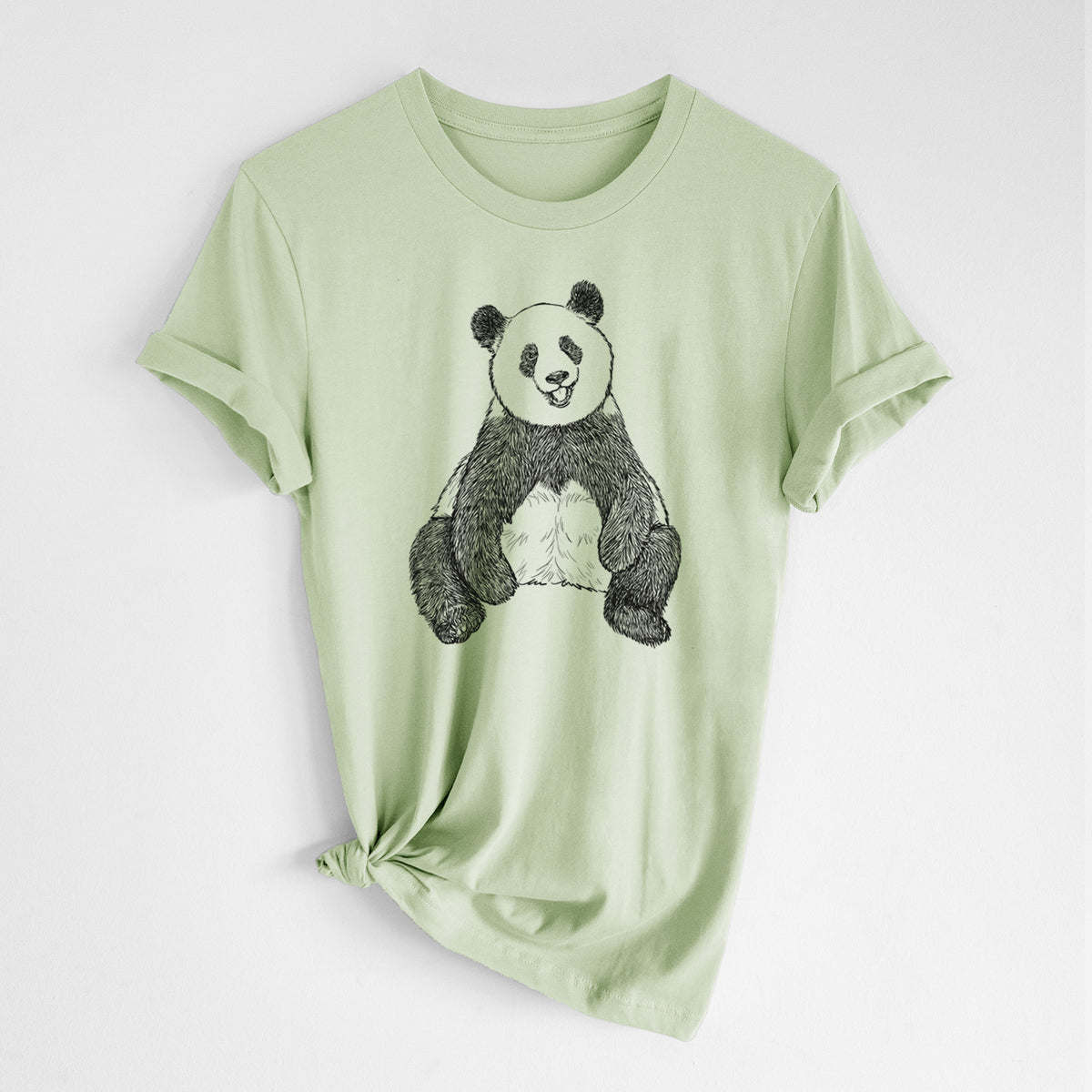 Spring green lightweight cotton t-shirt laid flat with the sleeves rolled, printed with a black ink illustration of a giant panda sitting and facing forward.