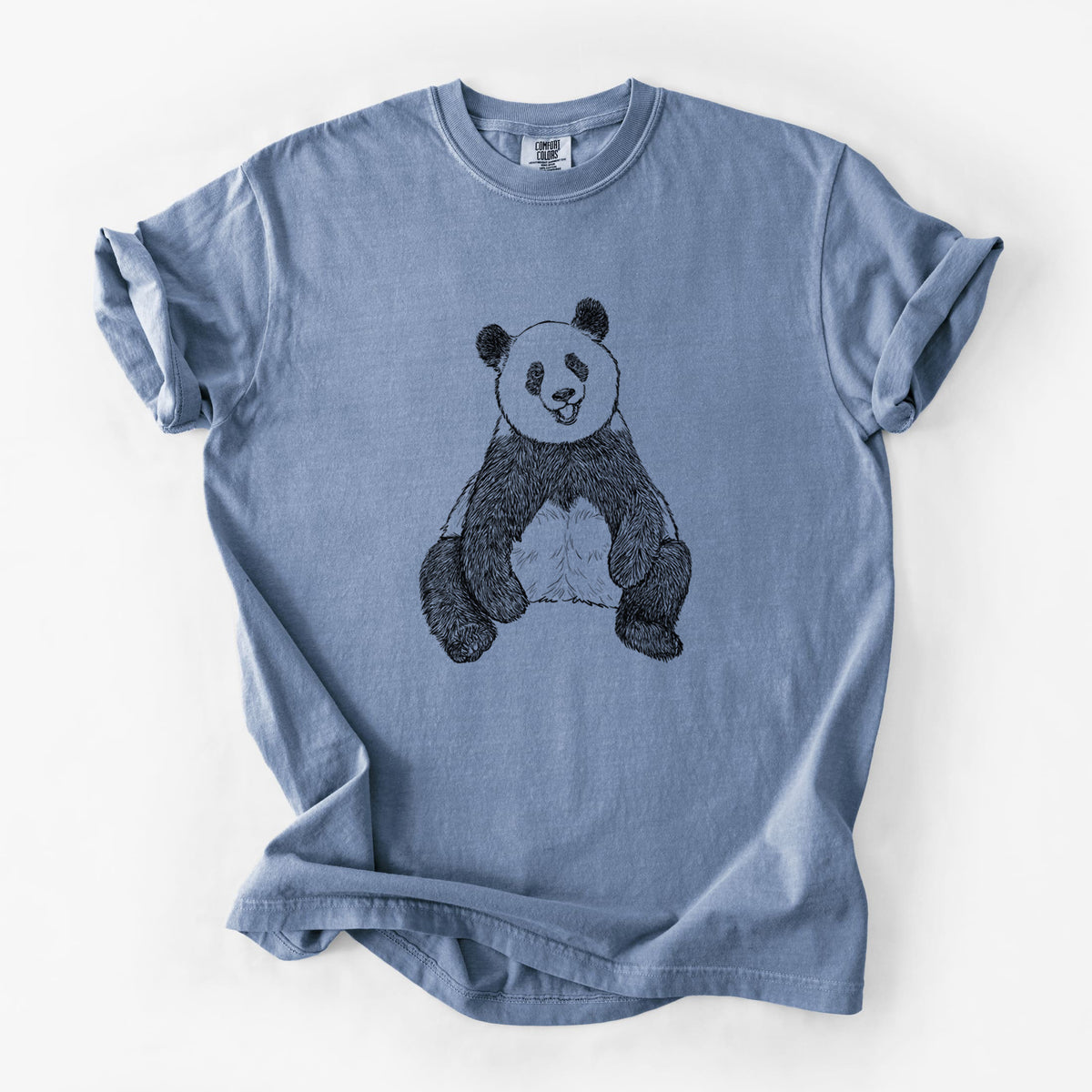 Blue jean Comfort Colors t-shirt laid flat, printed with a black ink illustration of a giant panda sitting and facing forward.