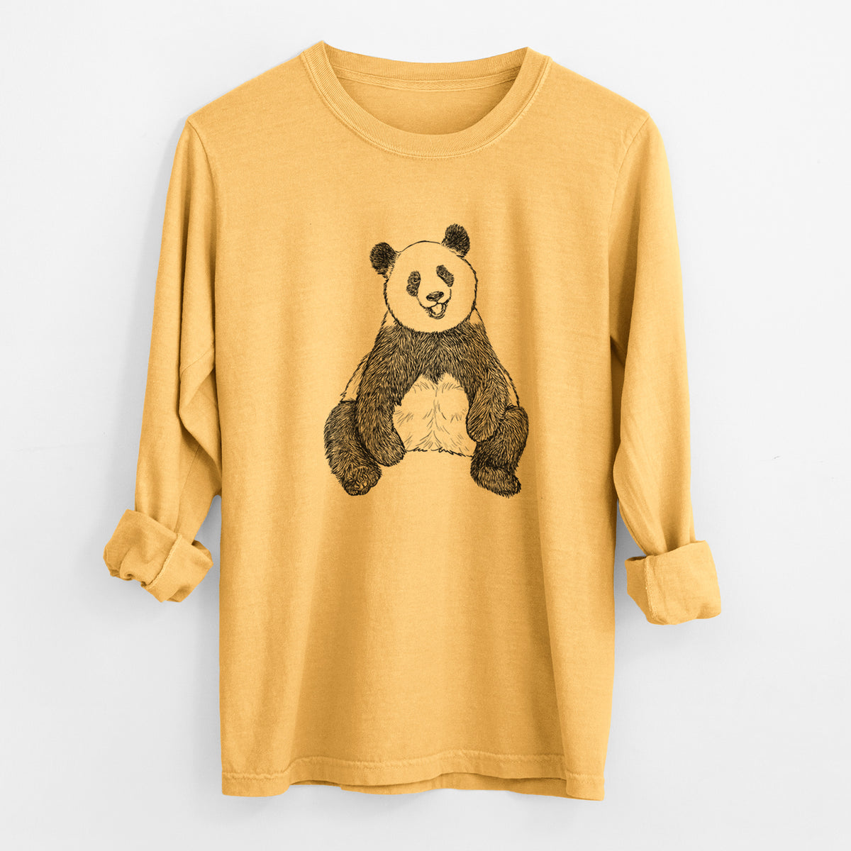 Golden wheat yellow Comfort Colors long sleeve shirt laid flat with the cuffs rolled, printed with a black ink illustration of a giant panda sitting and facing forward.