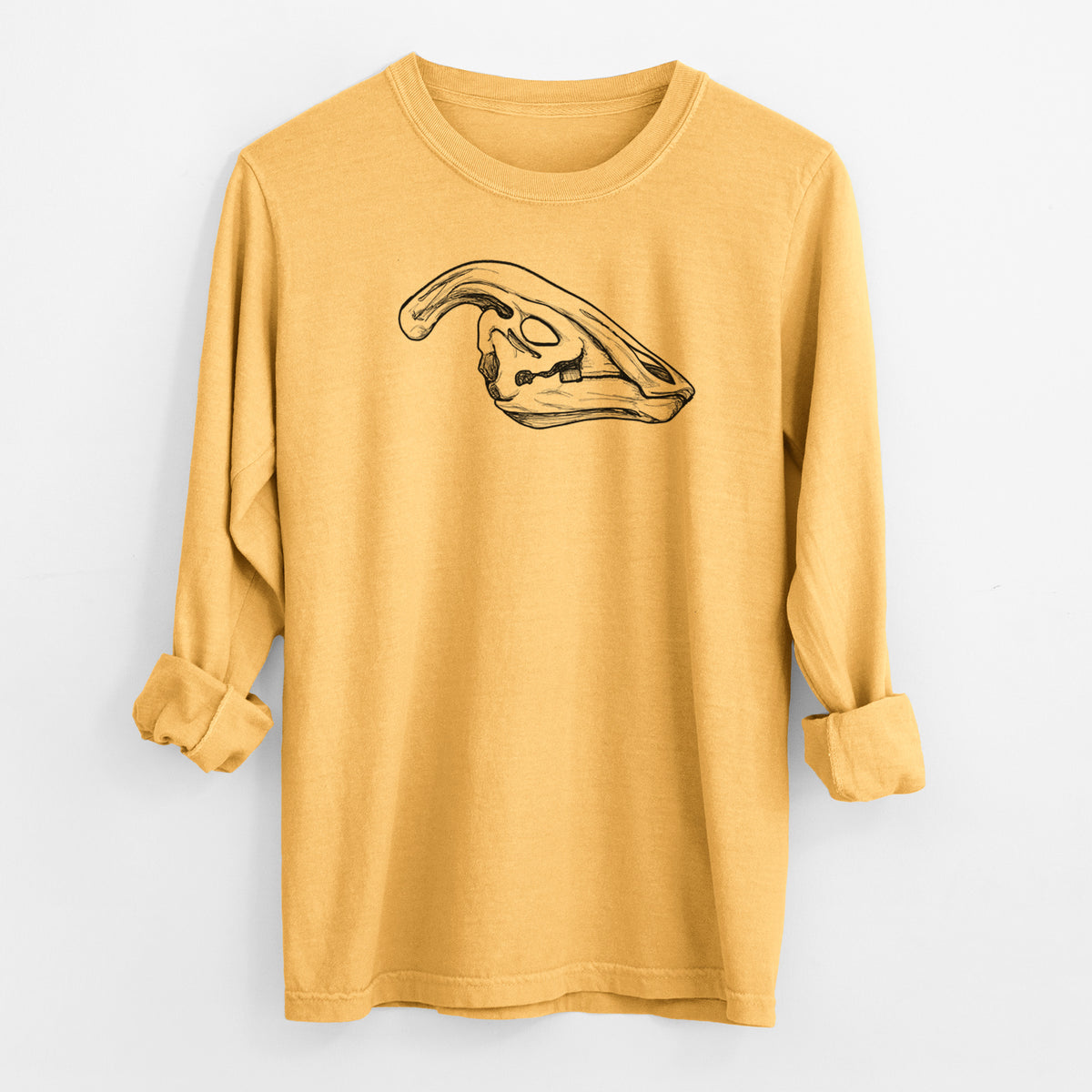 Golden wheat yellow Comfort Colors long sleeve shirt laid flat with the cuffs rolled, printed with a detailed black ink illustration of a crested Parasaurolophus skull.
