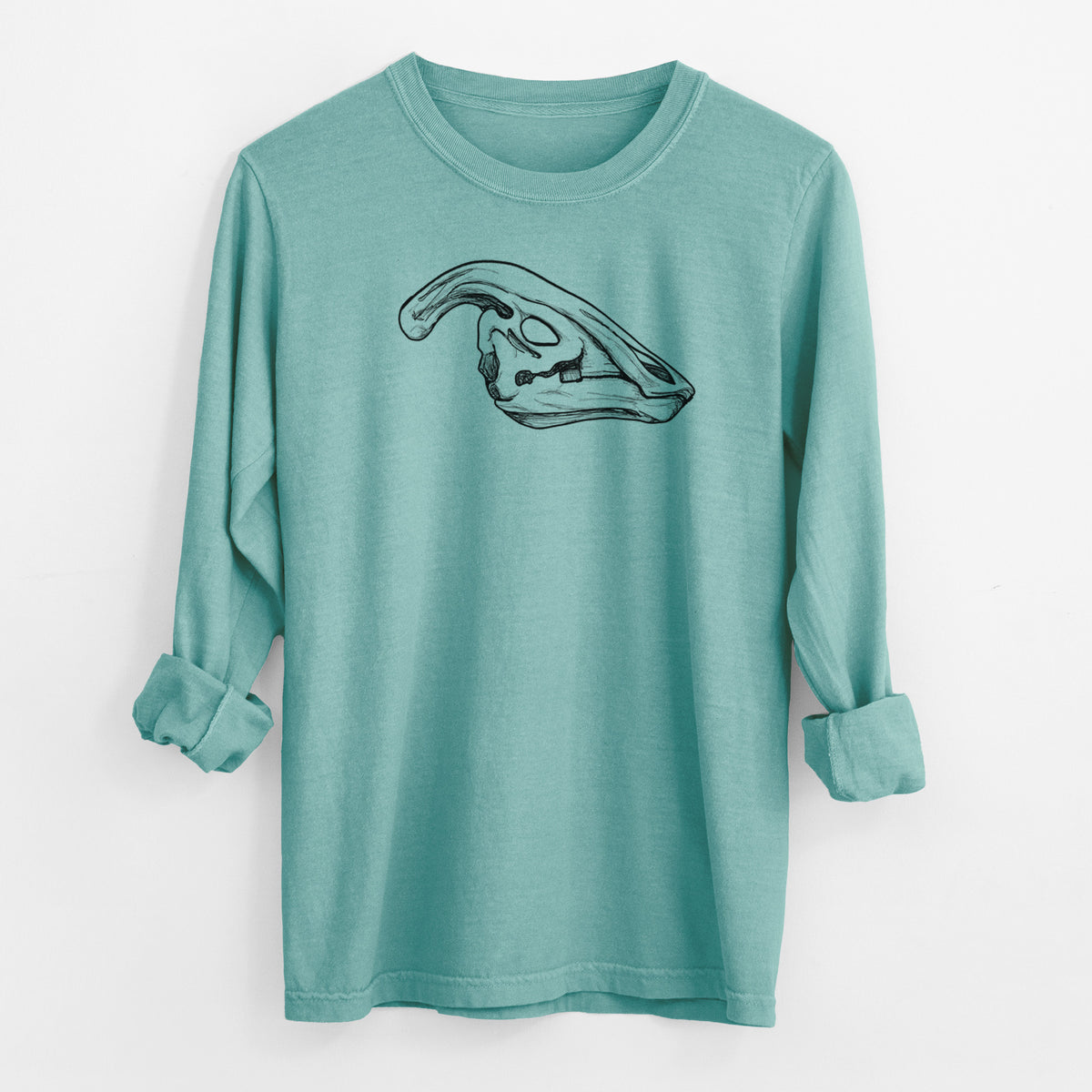 Reef green Comfort Colors long sleeve shirt laid flat with the cuffs rolled, printed with a detailed black ink illustration of a crested Parasaurolophus skull.