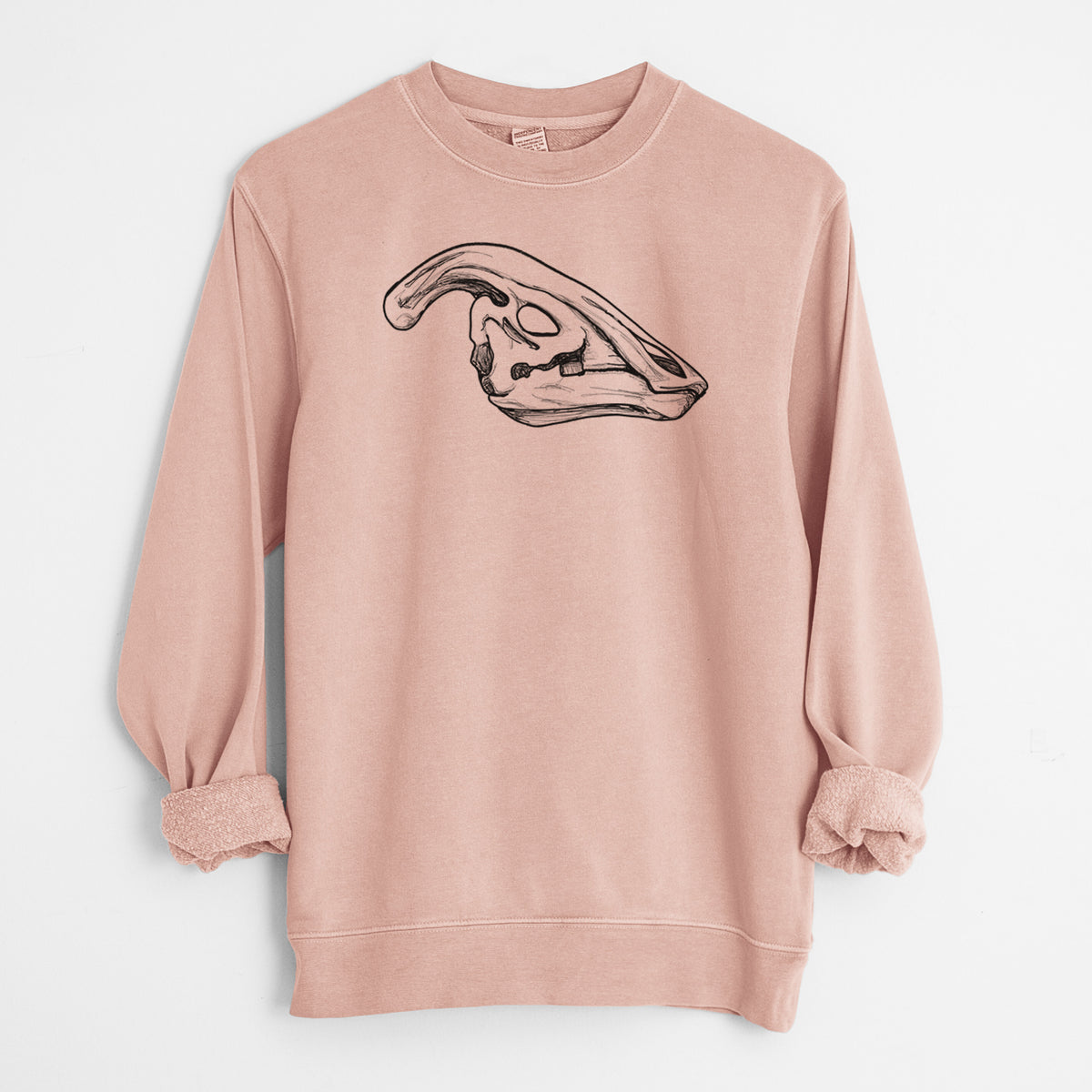 Dusty pink pigment dyed crewneck sweatshirt laid flat with the sleeves rolled, printed with a detailed black ink illustration of a crested Parasaurolophus skull.