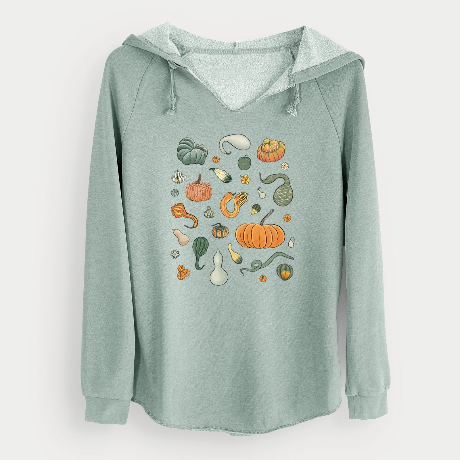 Sage green women's Cali Wave hooded sweatshirt laid flat, printed with a full-color collection of pumpkins, squash and gourds in many shapes and colors.