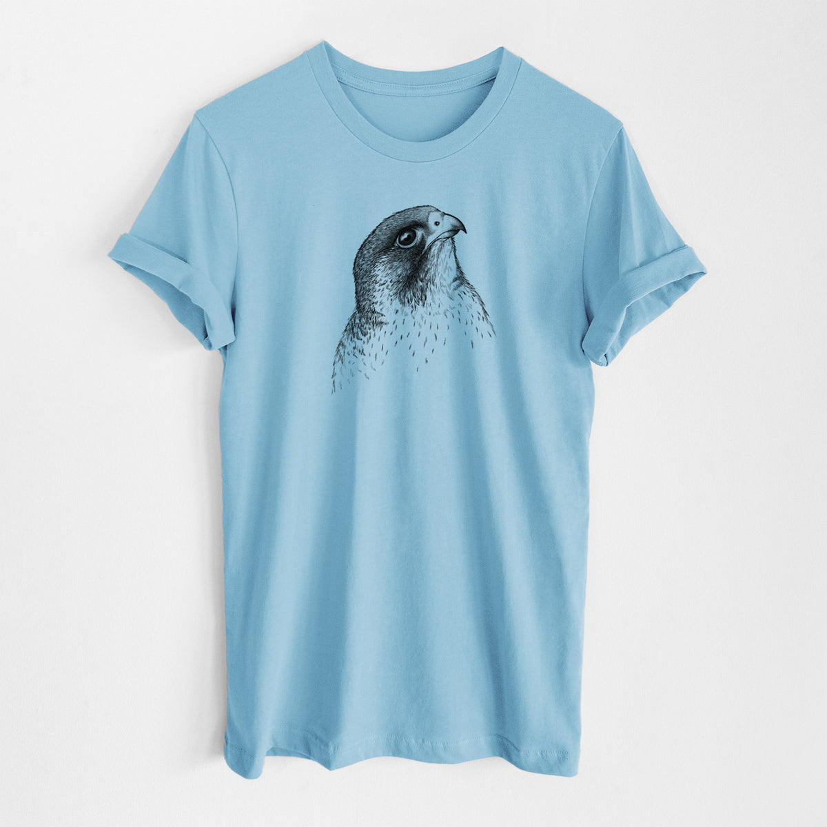 Ocean blue lightweight cotton t-shirt laid flat, printed with a detailed black ink portrait of a peregrine falcon's head.