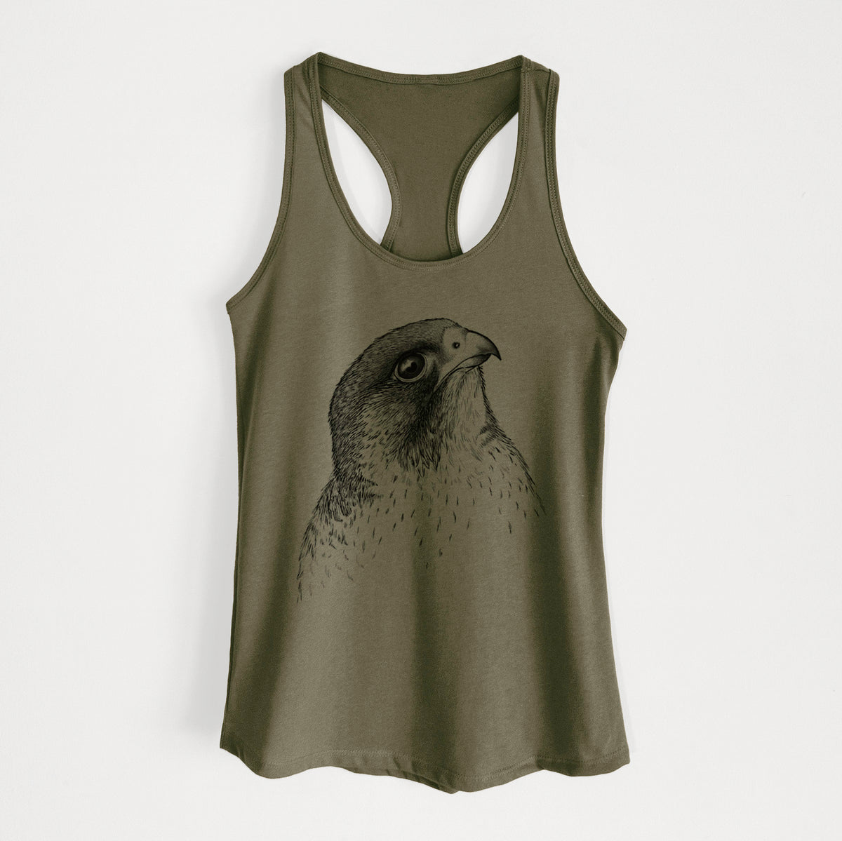 Military green women's racerback tank top laid flat, printed with a detailed black ink portrait of a peregrine falcon's head.