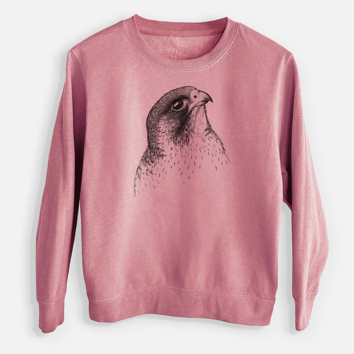 Mauve pink youth crewneck sweatshirt laid flat, printed with a detailed black ink portrait of a peregrine falcon's head.