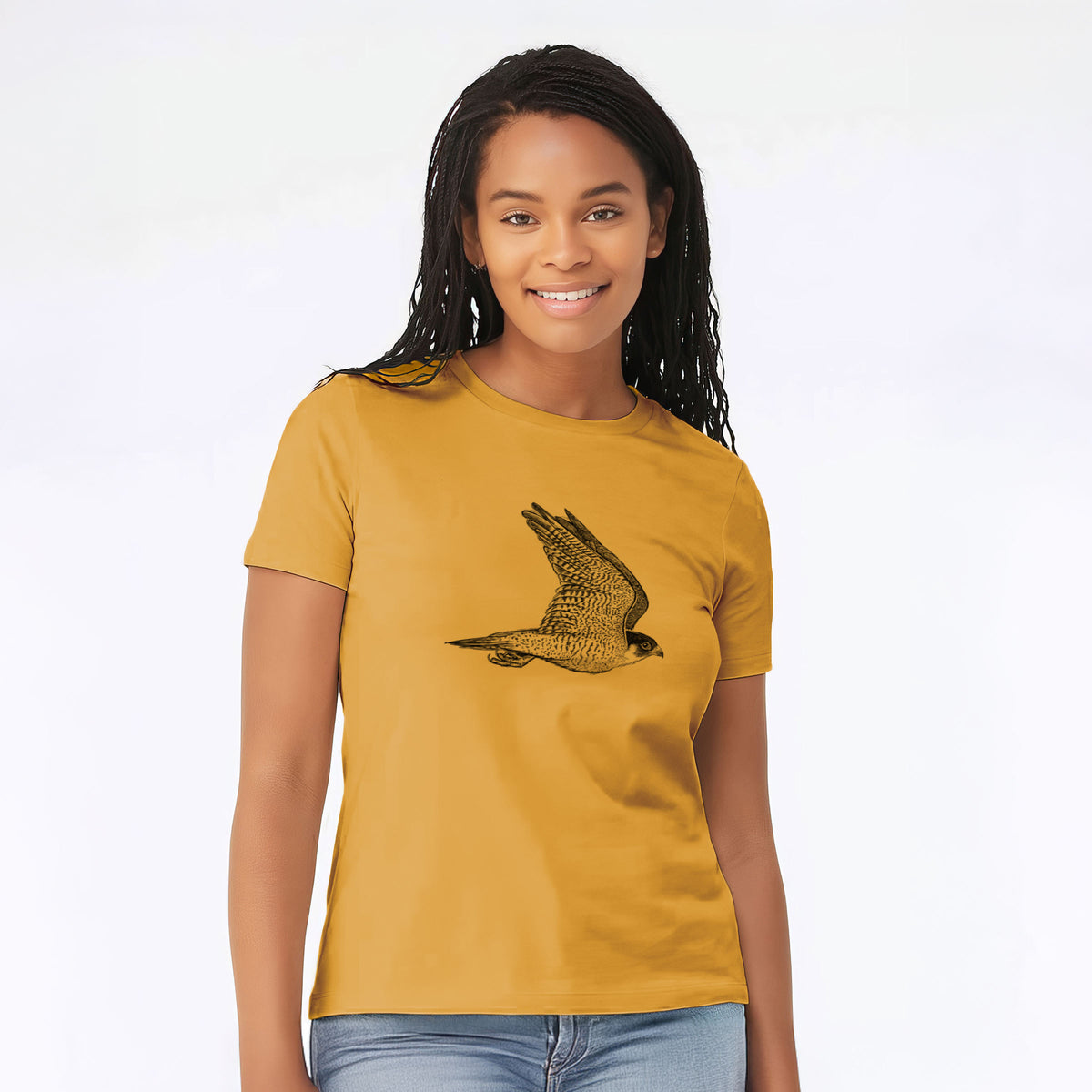 Woman wearing a mustard yellow women's relaxed fit cotton t-shirt printed with a detailed black ink illustration of a peregrine falcon in flight.