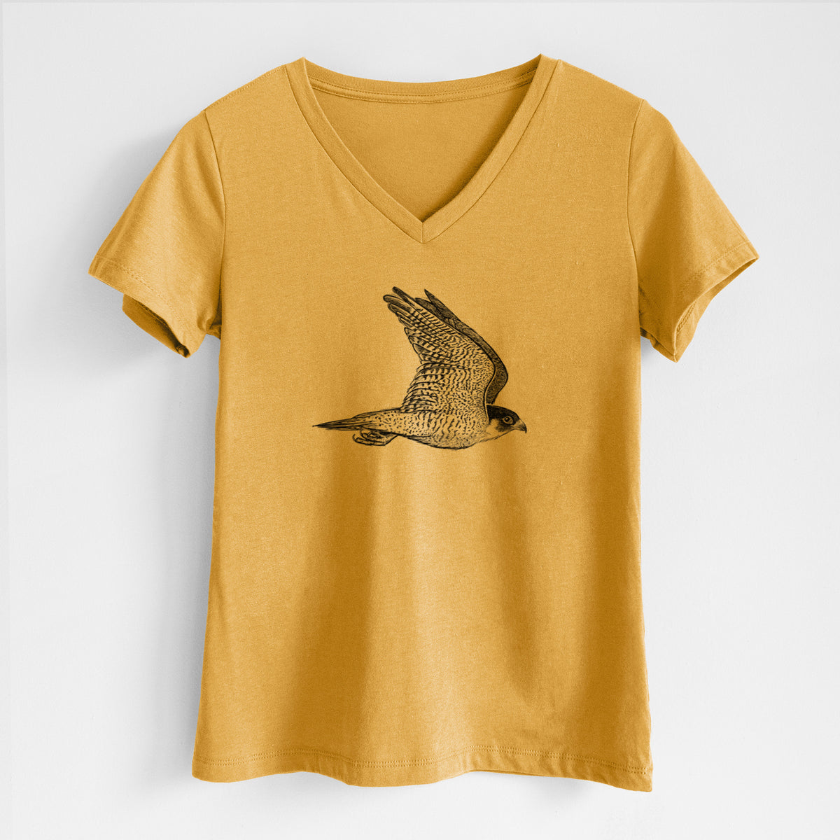 Honeycomb yellow women's relaxed fit cotton V-neck t-shirt laid flat, printed with a detailed black ink illustration of a peregrine falcon in flight.