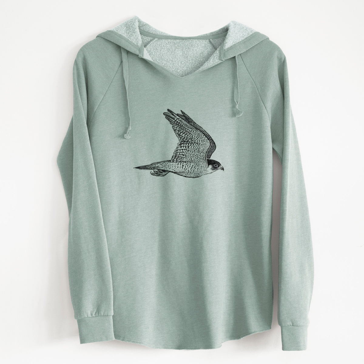 Sage green women's Cali Wave hooded sweatshirt laid flat, printed with a detailed black ink illustration of a peregrine falcon in flight.