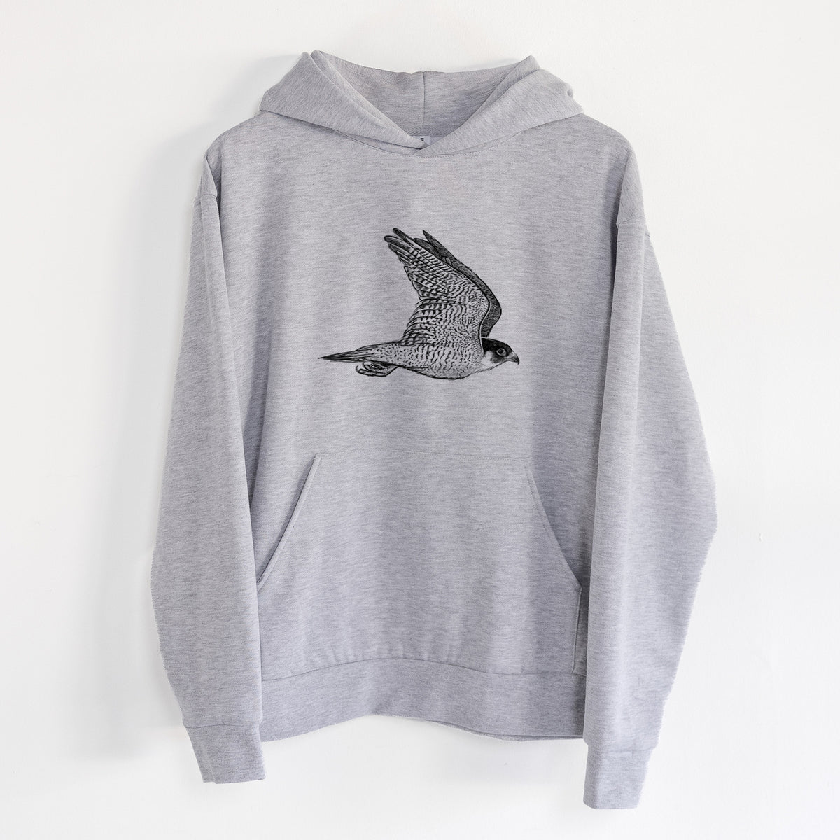 Flying Peregrine - Falco peregrinus - Statement Midweight Hoodie in Heather Grey, hanging on a white wall, with a front kangaroo pocket and no drawcords.