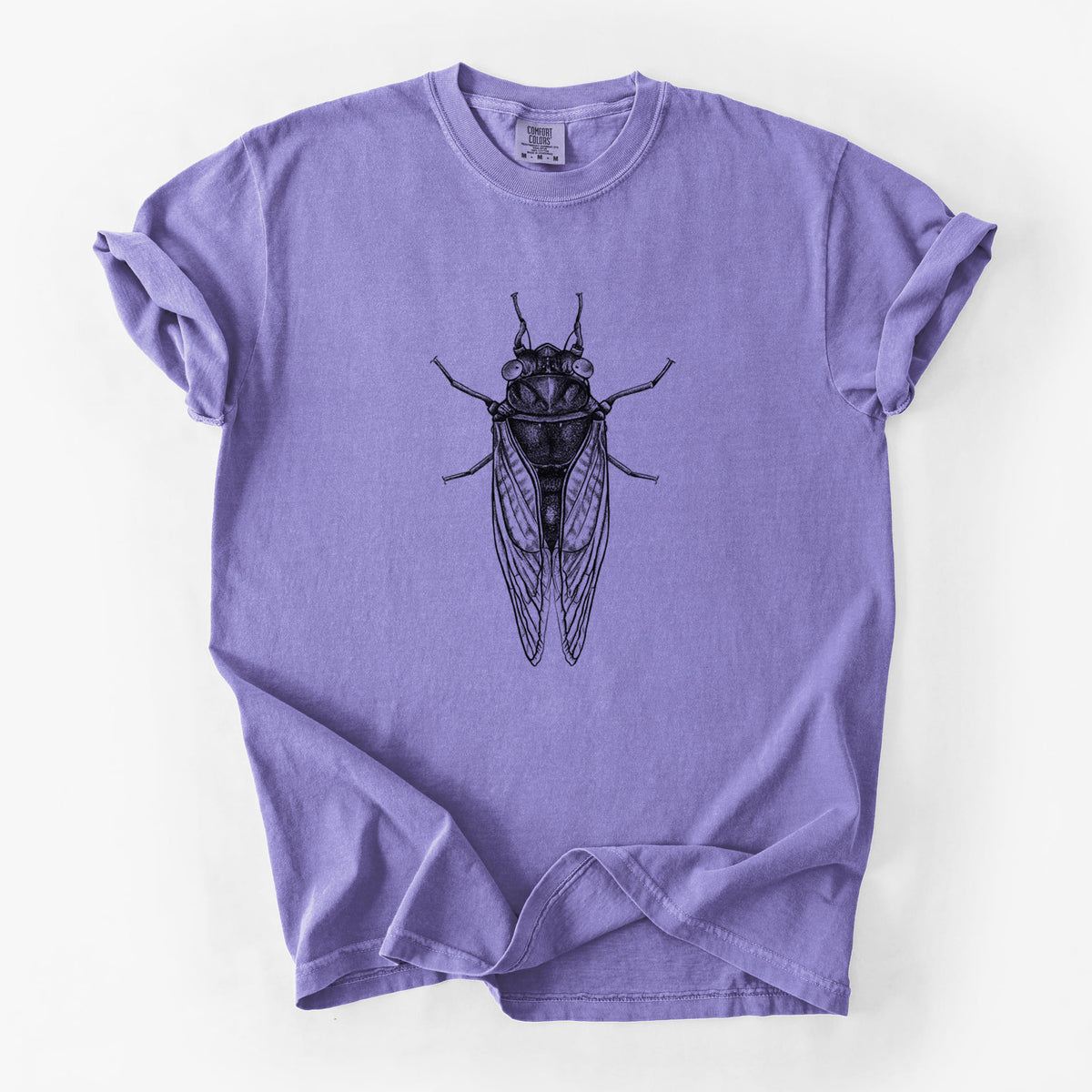 Violet purple Comfort Colors t-shirt laid flat, printed with a detailed black ink illustration of a periodical cicada with its wings folded, seen from above.