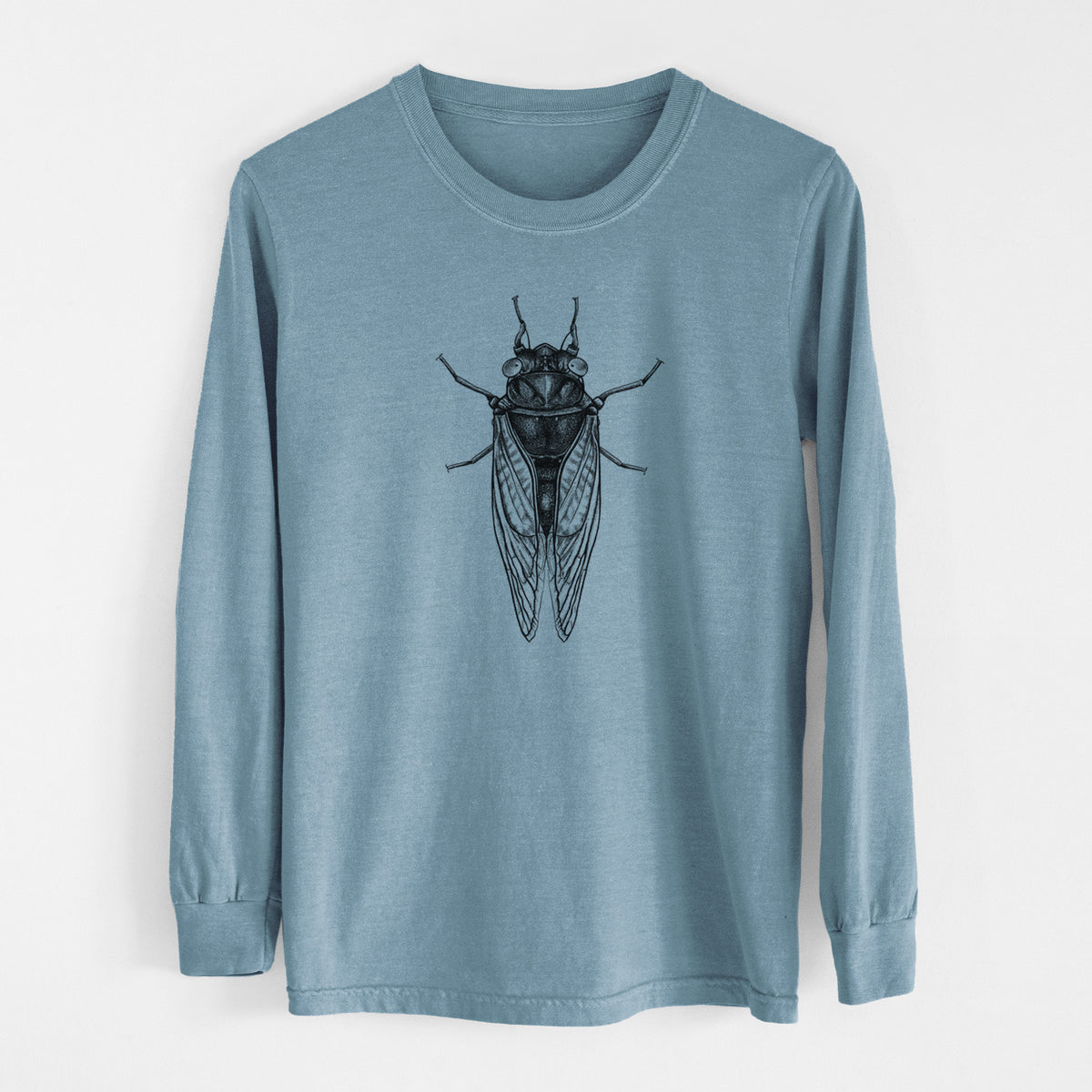 Steel blue Comfort Colors long sleeve shirt laid flat, printed with a detailed black ink illustration of a periodical cicada with its wings folded, seen from above.