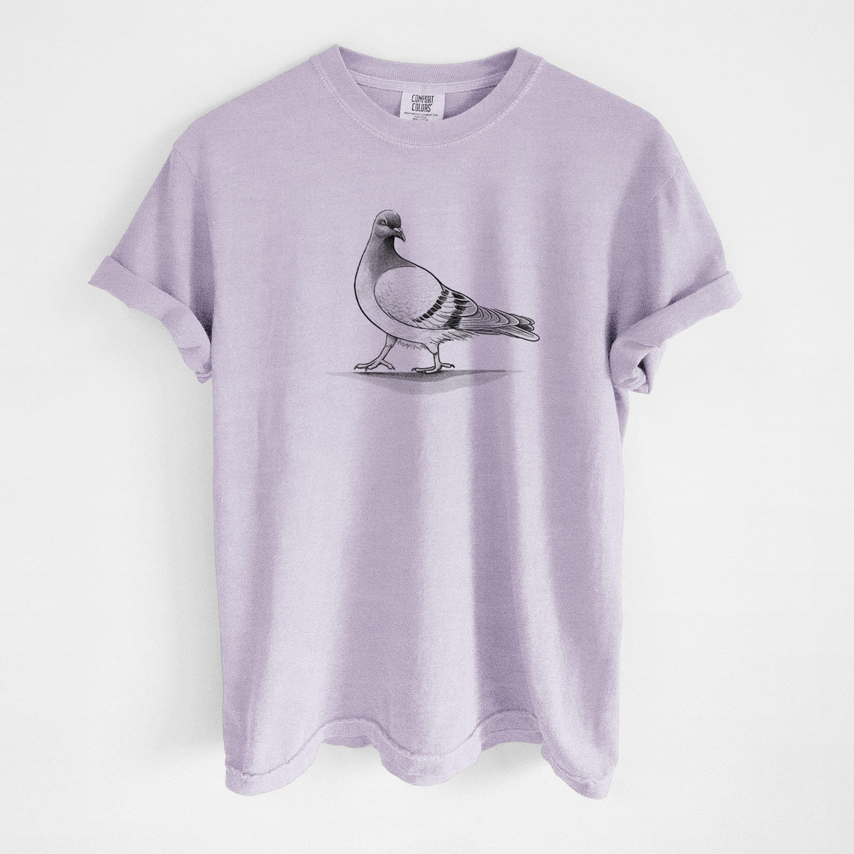 Orchid purple Comfort Colors t-shirt laid flat, printed with a black ink illustration of a pigeon standing.