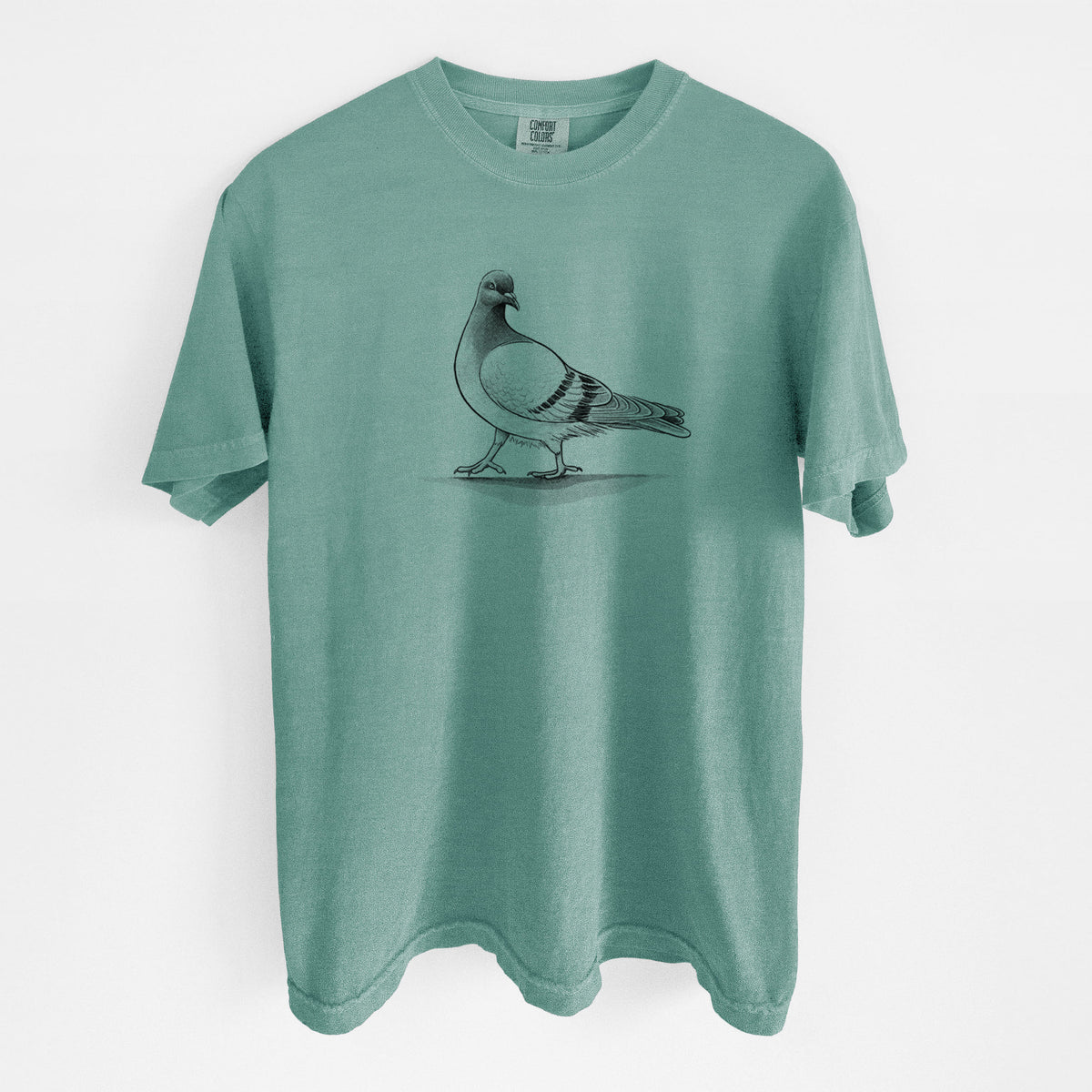 Reef green Comfort Colors t-shirt laid flat, printed with a black ink illustration of a pigeon standing.