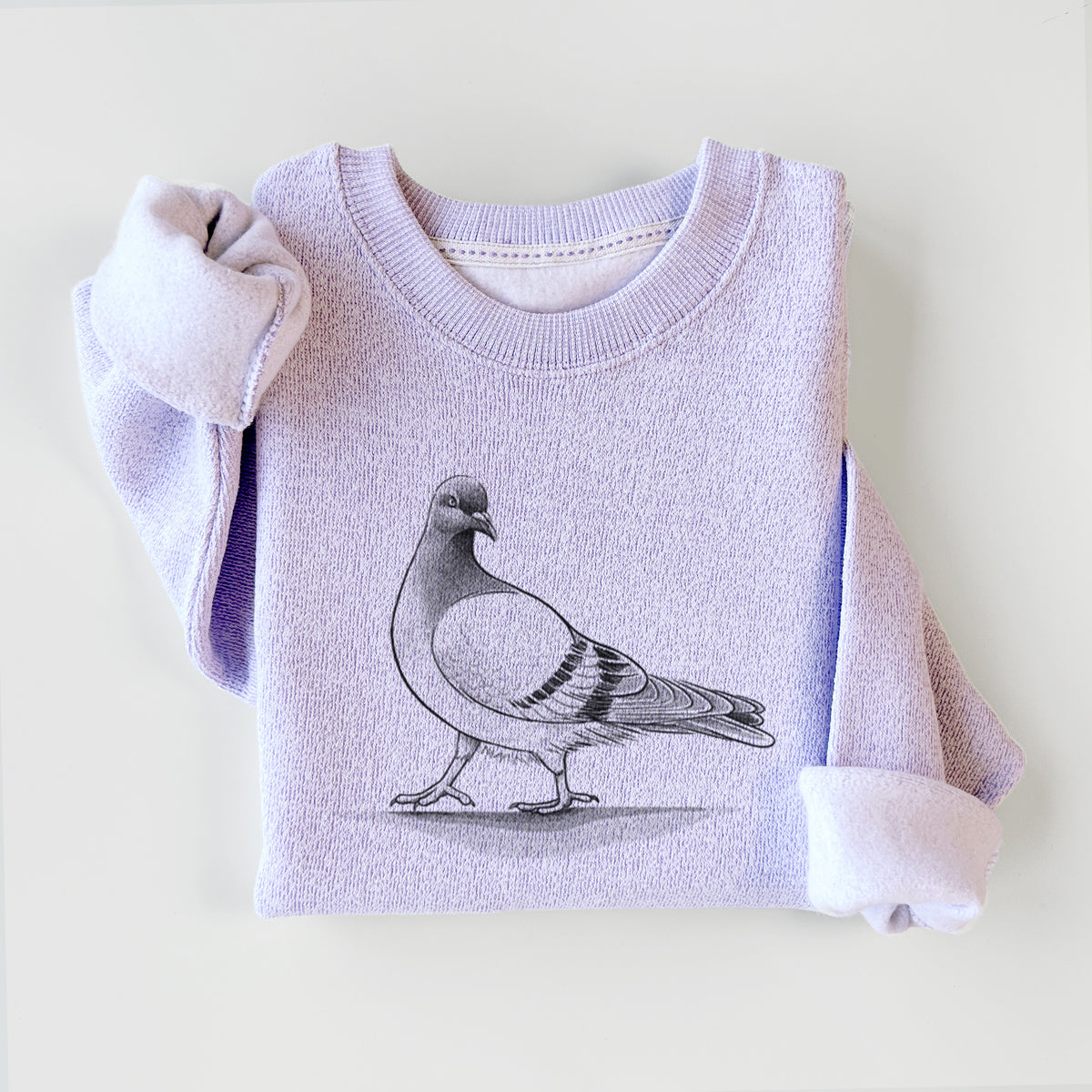 Ice purple knit sweatshirt printed with a black ink illustration of a pigeon standing, styled flat.