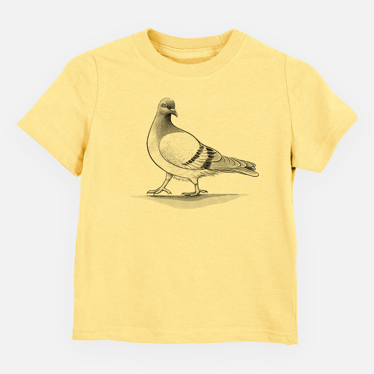 Butter yellow toddler t-shirt laid flat, printed with a black ink illustration of a pigeon standing.