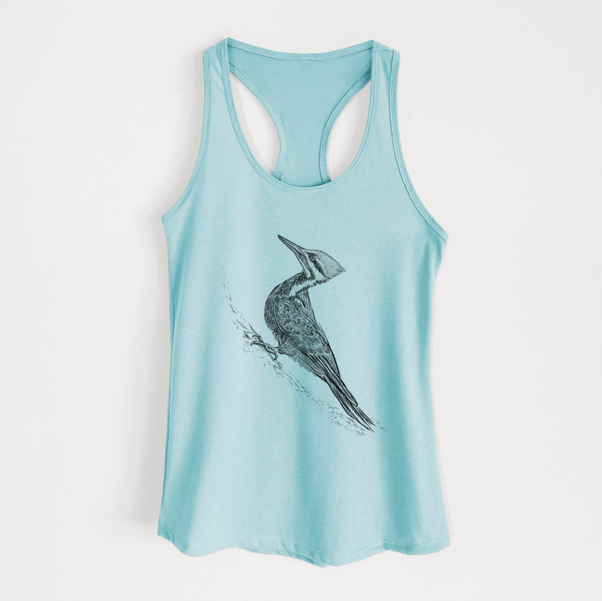 Cancun blue women's racerback tank top laid flat, printed with a black ink illustration of a pileated woodpecker clinging to a tree trunk.