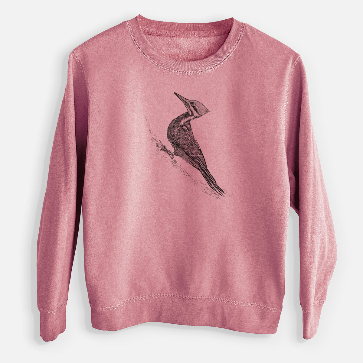 Mauve pink youth crewneck sweatshirt laid flat, printed with a black ink illustration of a pileated woodpecker clinging to a tree trunk.