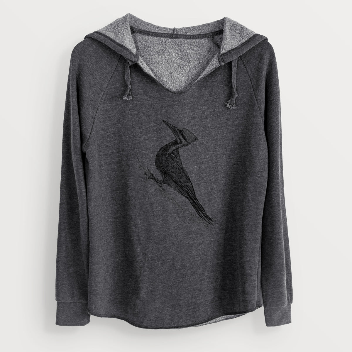 Charcoal grey women's Cali Wave hooded sweatshirt laid flat, printed with a black ink illustration of a pileated woodpecker clinging to a tree trunk.