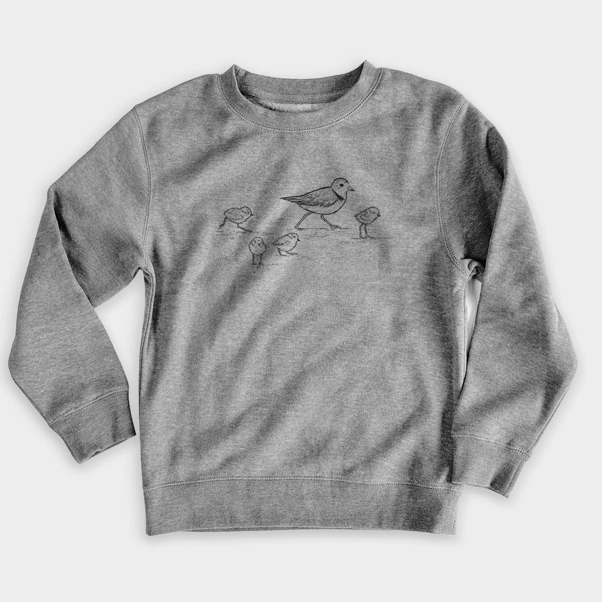 Nickel grey youth crewneck sweatshirt laid flat, printed with a black ink sketch of a piping plover with its chicks on the sand.