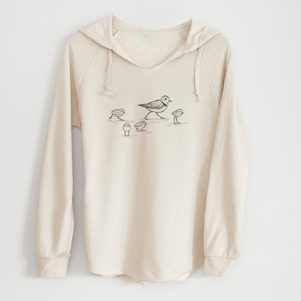 Bone cream women's Cali Wave hooded sweatshirt laid flat, printed with a black ink sketch of a piping plover with its chicks on the sand.