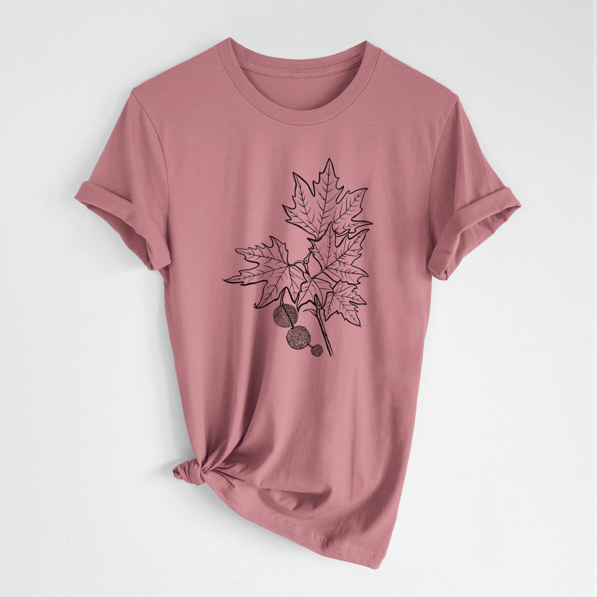 Mauve pink lightweight cotton t-shirt laid flat with the sleeves rolled, printed with a black ink illustration of an oriental plane tree branch with lobed leaves and round seed balls.