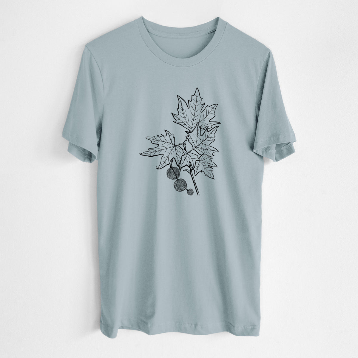 Vintage denim lightweight cotton t-shirt laid flat, printed with a black ink illustration of an oriental plane tree branch with lobed leaves and round seed balls.