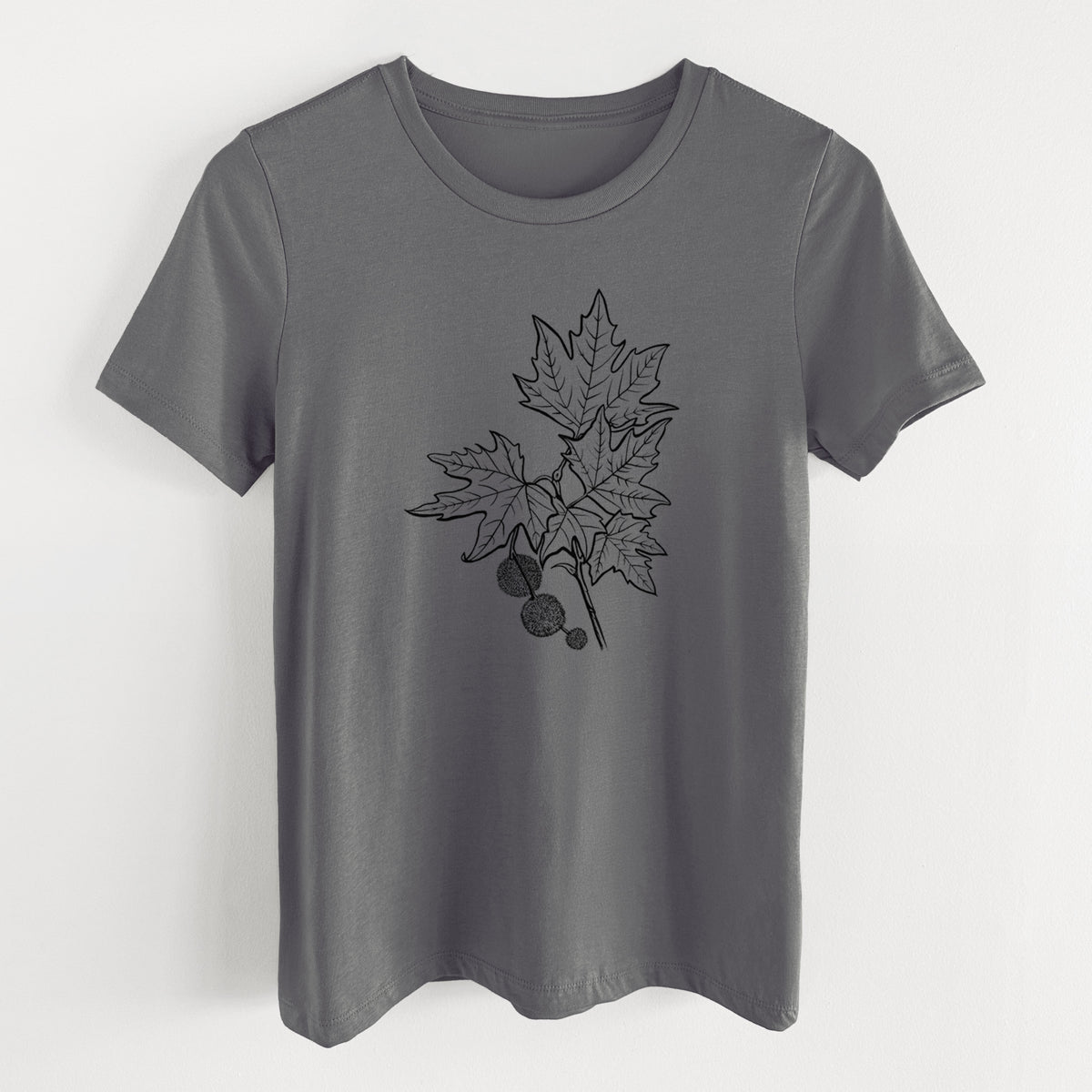 Asphalt women's relaxed fit cotton t-shirt laid flat, printed with a black ink illustration of an oriental plane tree branch with lobed leaves and round seed balls.