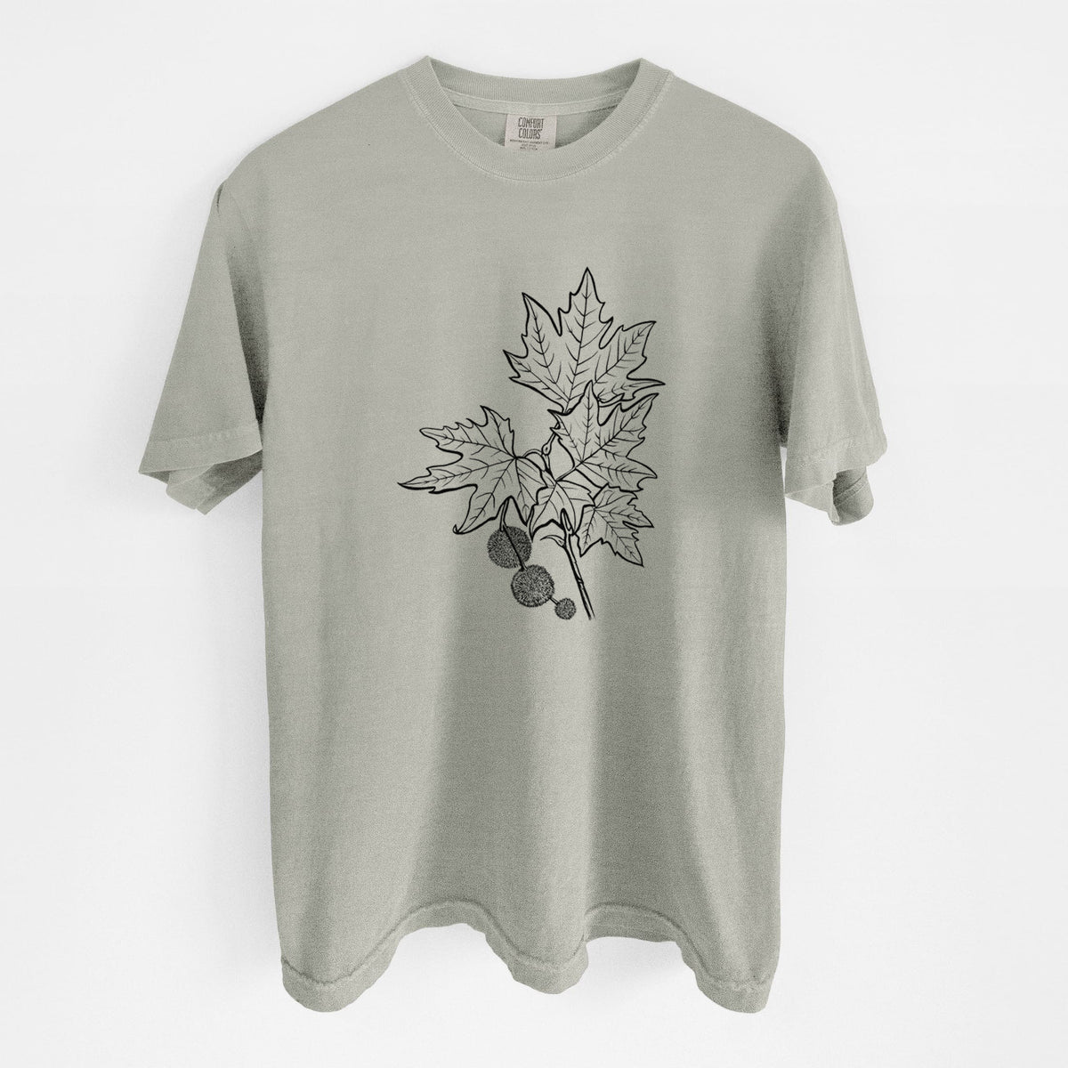 Sandstone beige Comfort Colors t-shirt laid flat, printed with a black ink illustration of an oriental plane tree branch with lobed leaves and round seed balls.