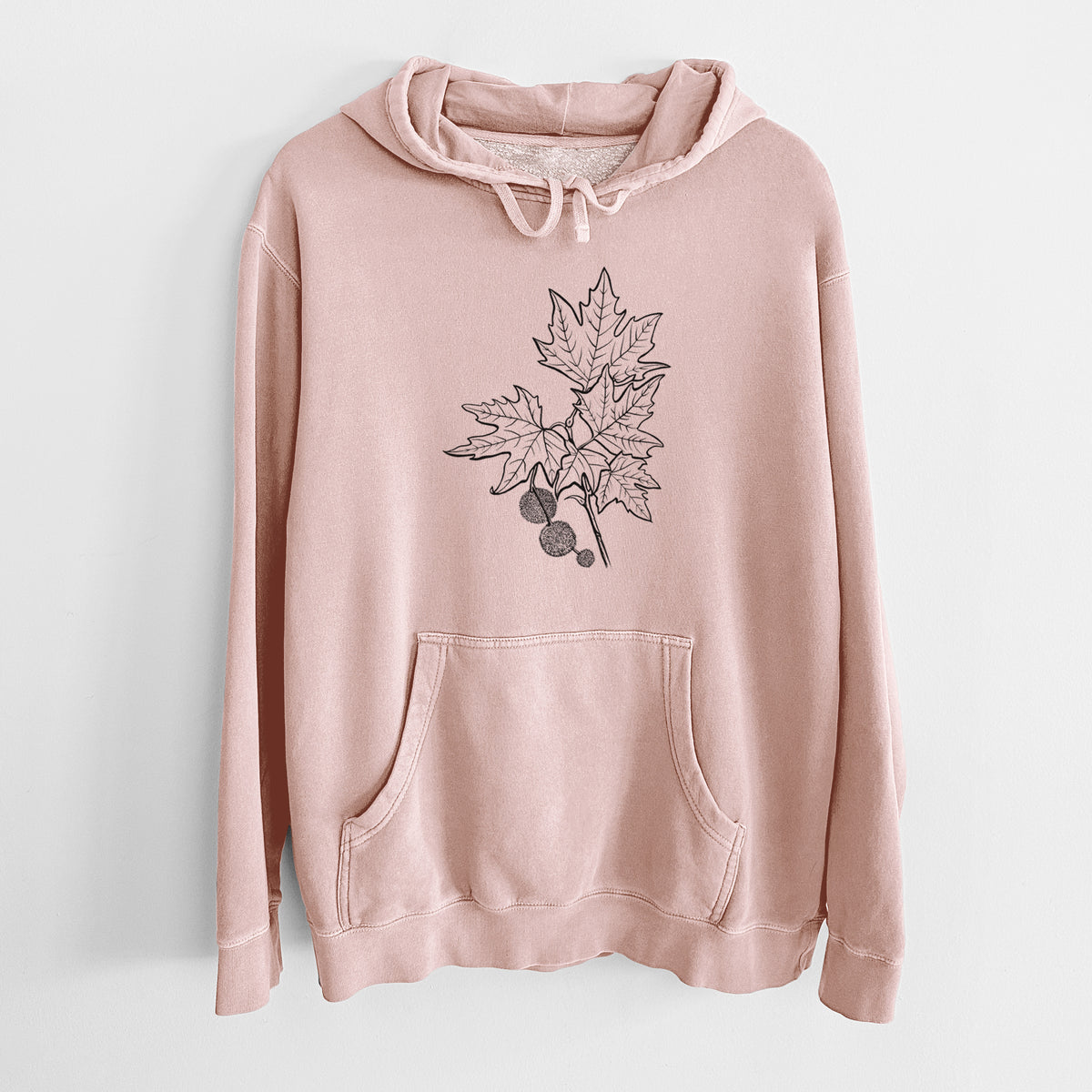Dusty pink pigment dyed hoodie laid flat, printed with a black ink illustration of an oriental plane tree branch with lobed leaves and round seed balls.
