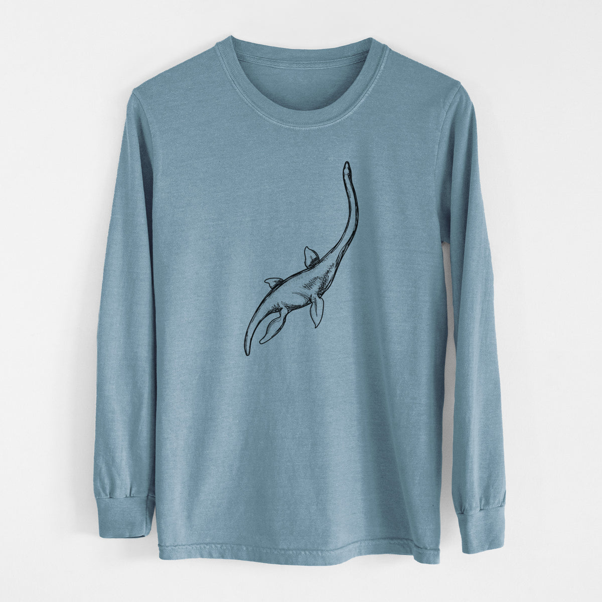 Steel blue Comfort Colors long sleeve shirt laid flat, printed with a black ink illustration of a long-necked plesiosaur swimming.