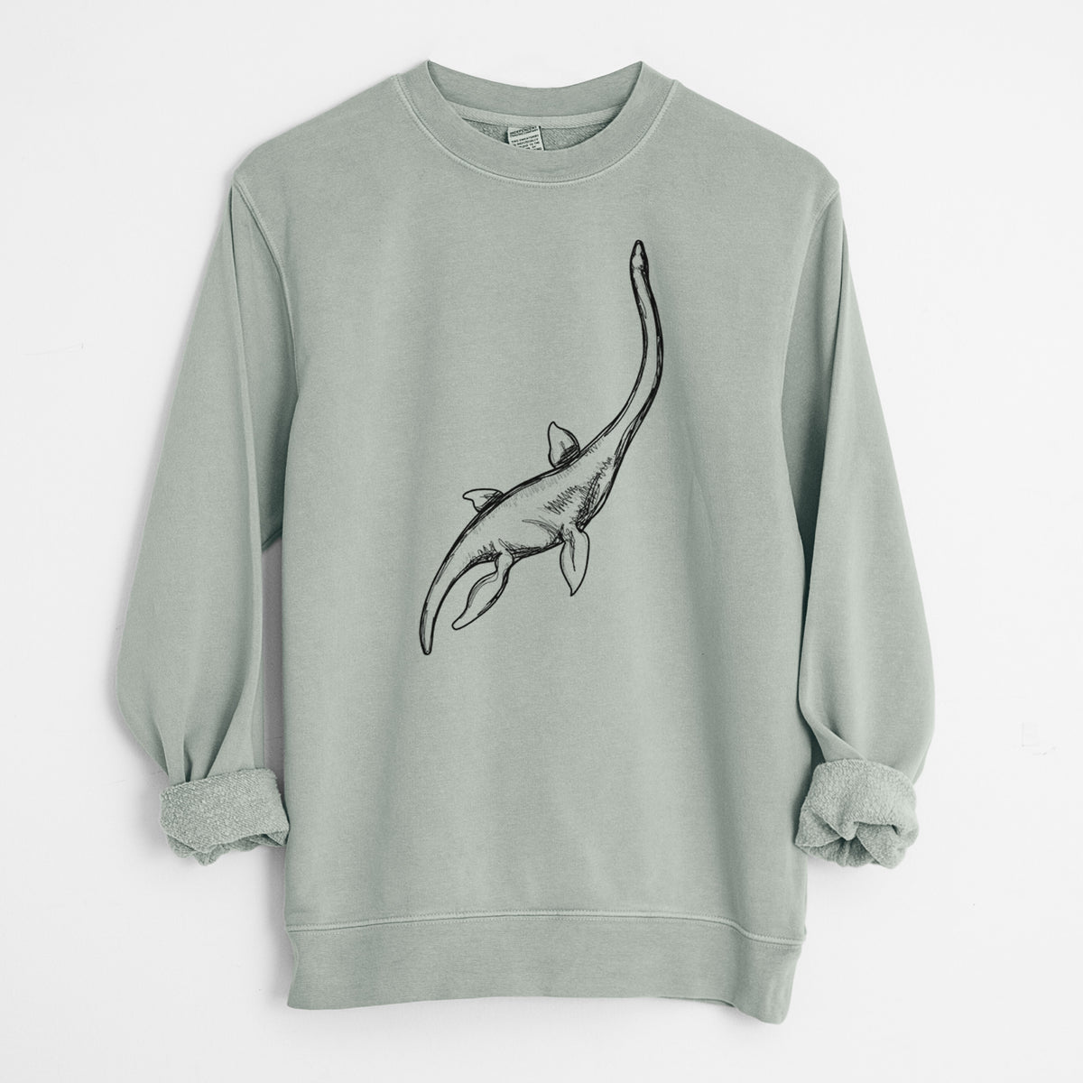Sage green pigment dyed crewneck sweatshirt laid flat with the sleeves rolled, printed with a black ink illustration of a long-necked plesiosaur swimming.