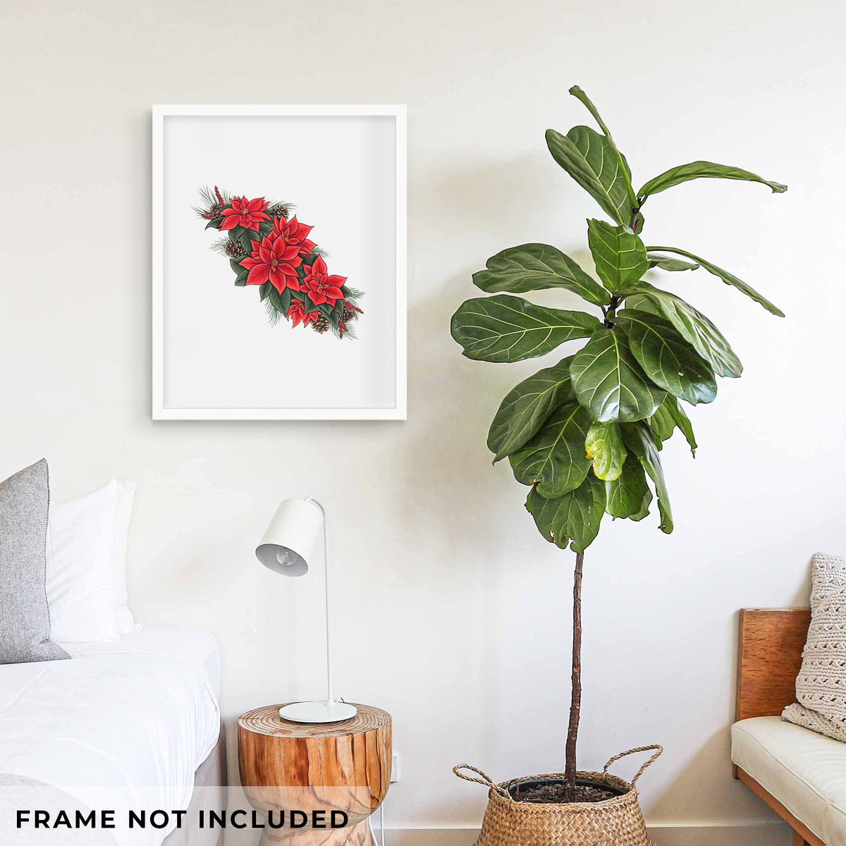 Art print of a full-color illustration of red poinsettia flowers with pine greenery and pine cones, shown framed on a living room wall beside a potted plant. Frame not included.