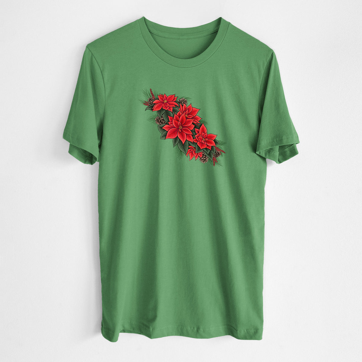 Leaf green lightweight cotton t-shirt laid flat, printed with a full-color illustration of red poinsettia flowers with pine greenery and pine cones.