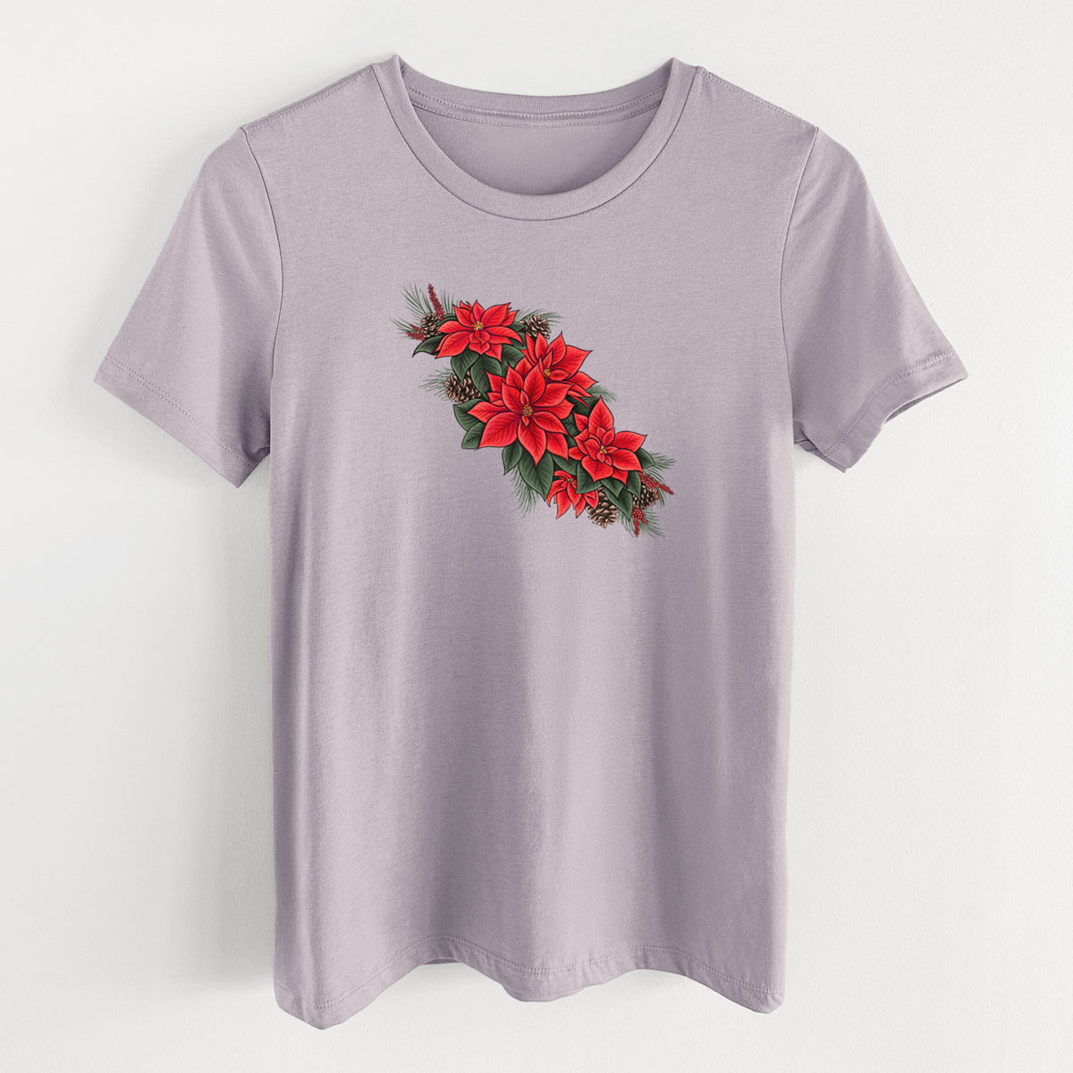 Light violet women's relaxed fit cotton t-shirt laid flat, printed with a full-color illustration of red poinsettia flowers with pine greenery and pine cones.