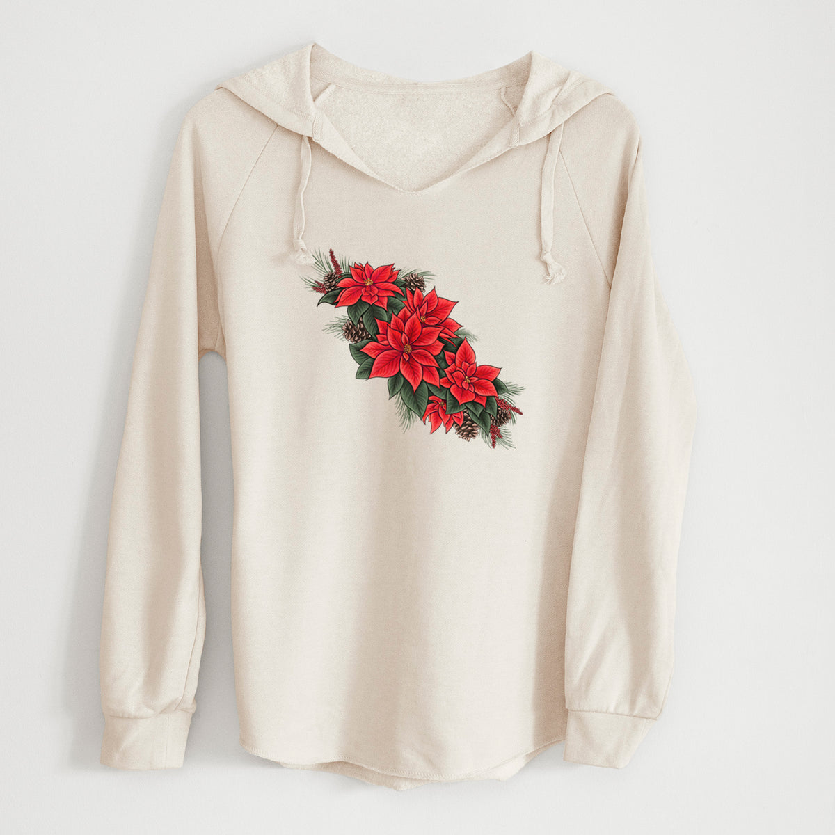 Bone cream women's Cali Wave hooded sweatshirt laid flat, printed with a full-color illustration of red poinsettia flowers with pine greenery and pine cones.