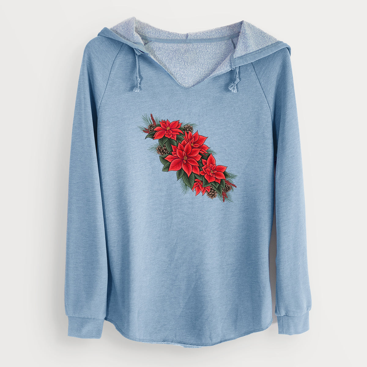 Misty blue women's Cali Wave hooded sweatshirt laid flat, printed with a full-color illustration of red poinsettia flowers with pine greenery and pine cones.