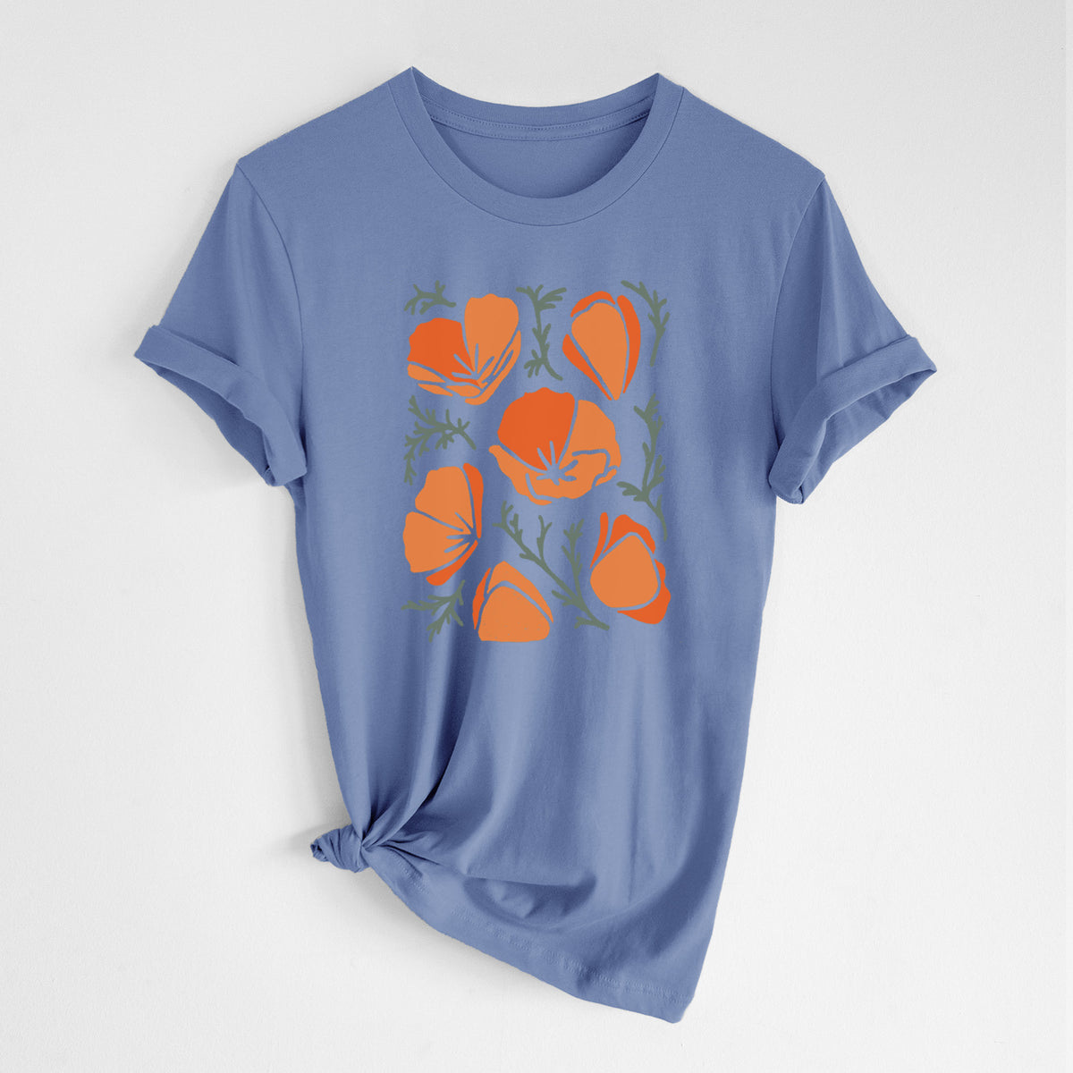 Blue bell lightweight cotton t-shirt laid flat with the sleeves rolled, printed with a full-color illustration of orange California poppies with blue-green leaves.