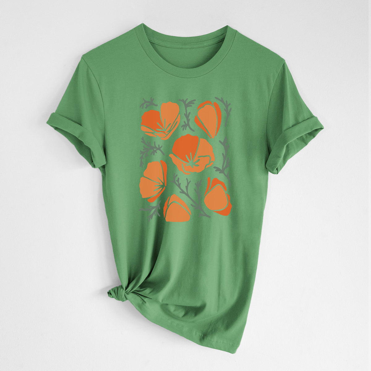 Leaf green lightweight cotton t-shirt laid flat with the sleeves rolled, printed with a full-color illustration of orange California poppies with blue-green leaves.