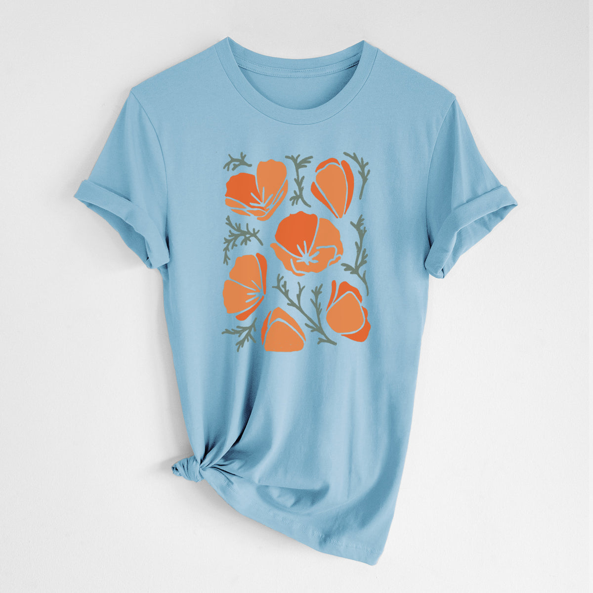Ocean blue lightweight cotton t-shirt laid flat with the sleeves rolled, printed with a full-color illustration of orange California poppies with blue-green leaves.