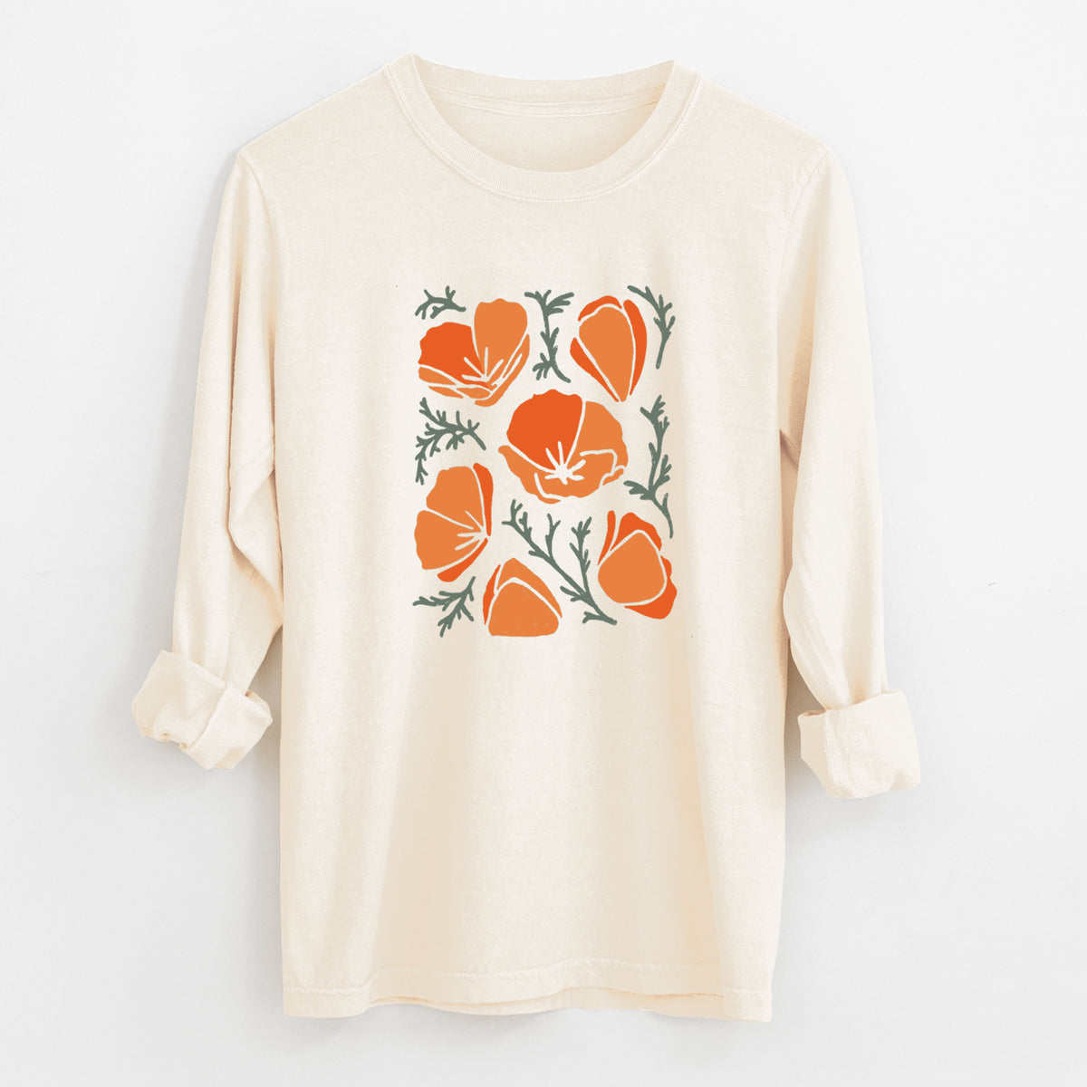 Ivory Comfort Colors long sleeve shirt laid flat with the cuffs rolled, printed with a full-color illustration of orange California poppies with blue-green leaves.