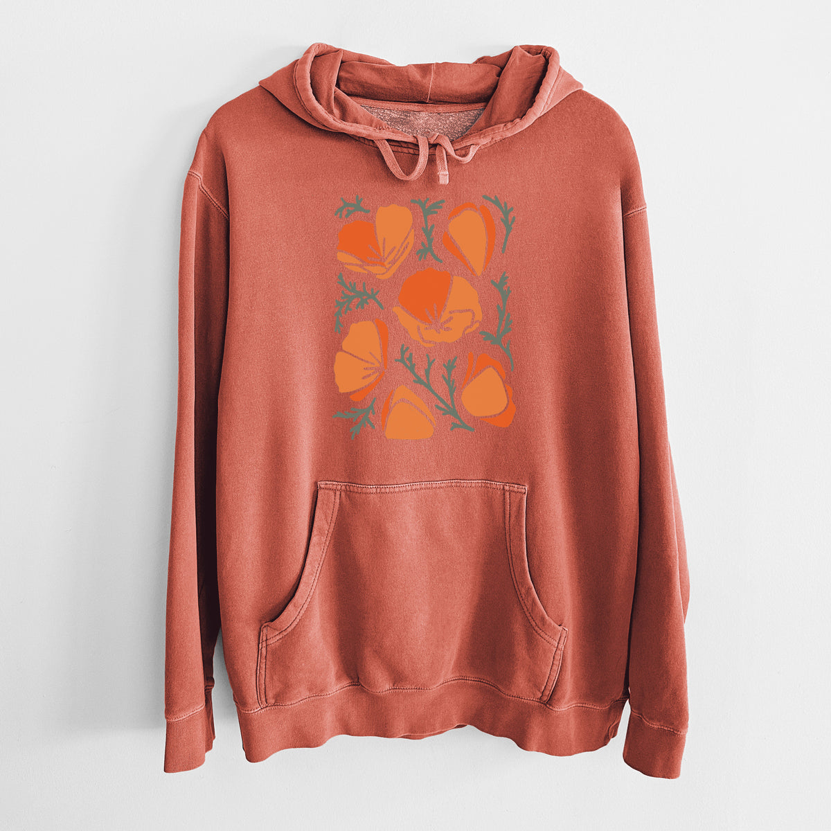 Amber orange pigment dyed hoodie laid flat, printed with a full-color illustration of orange California poppies with blue-green leaves.