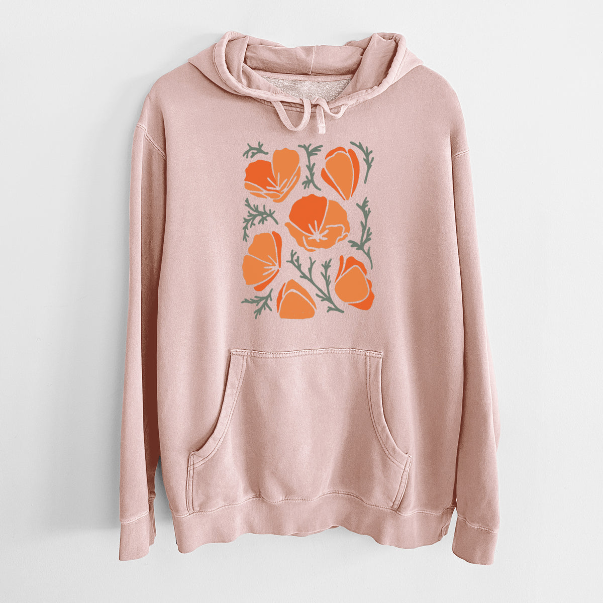 Dusty pink pigment dyed hoodie laid flat, printed with a full-color illustration of orange California poppies with blue-green leaves.