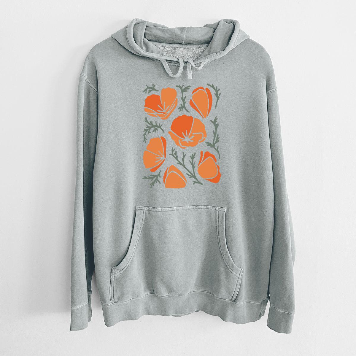 Sage green pigment dyed hoodie laid flat, printed with a full-color illustration of orange California poppies with blue-green leaves.