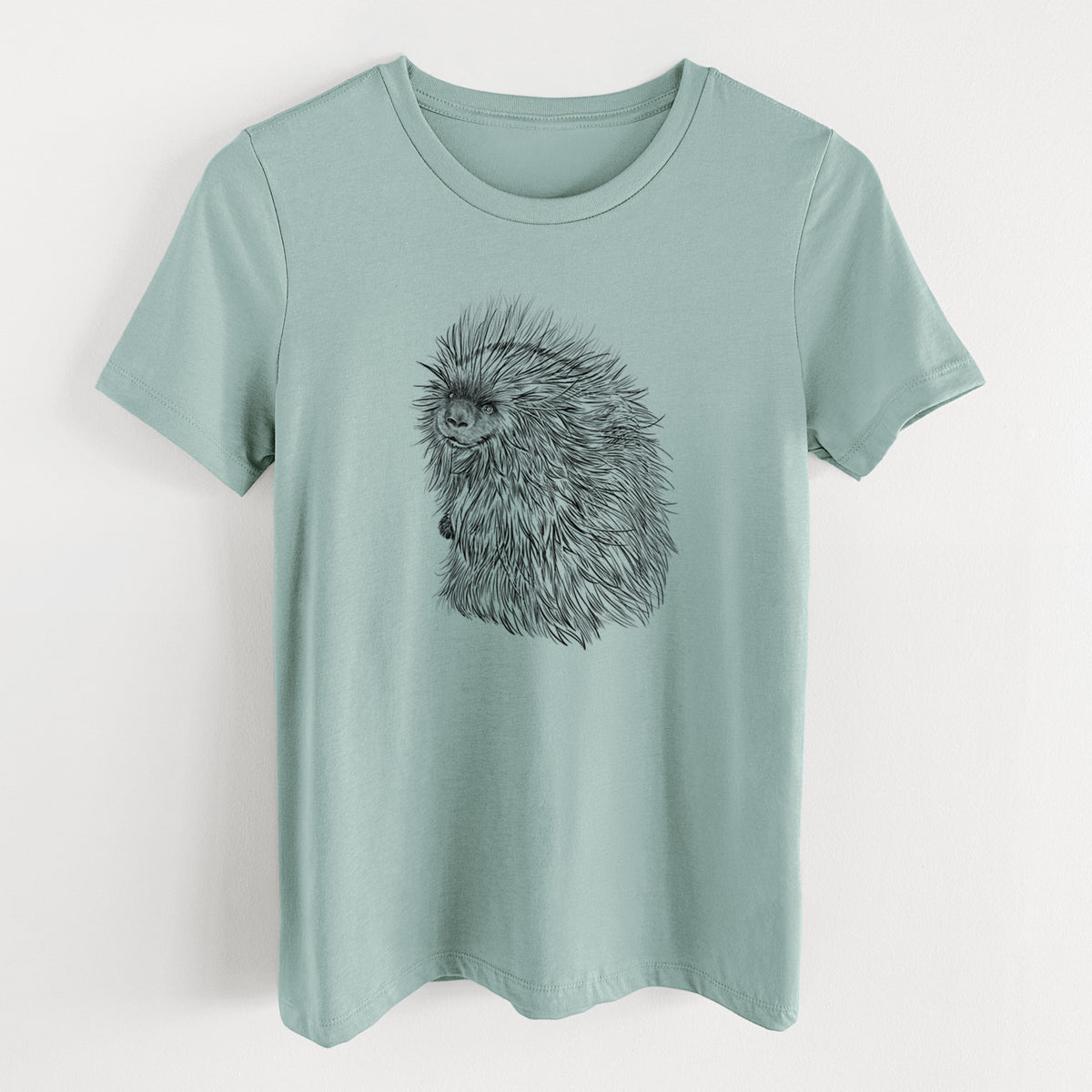 Dusty blue women's relaxed fit cotton t-shirt laid flat, printed with a detailed black ink illustration of a porcupine with its quills raised.