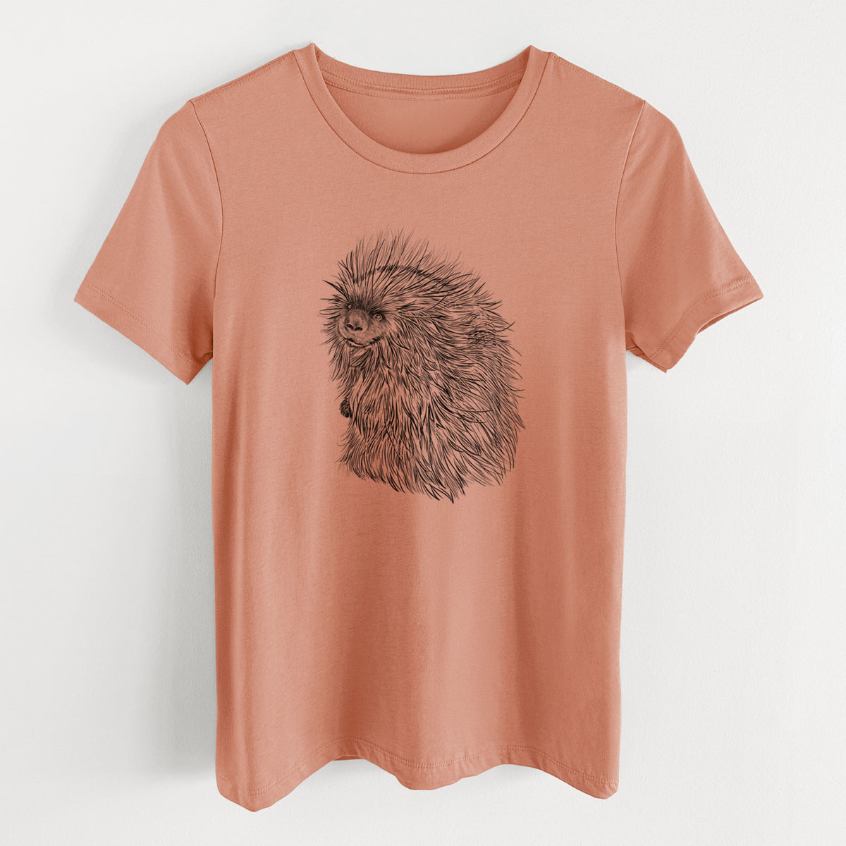 Terracotta orange women's relaxed fit cotton t-shirt laid flat, printed with a detailed black ink illustration of a porcupine with its quills raised.