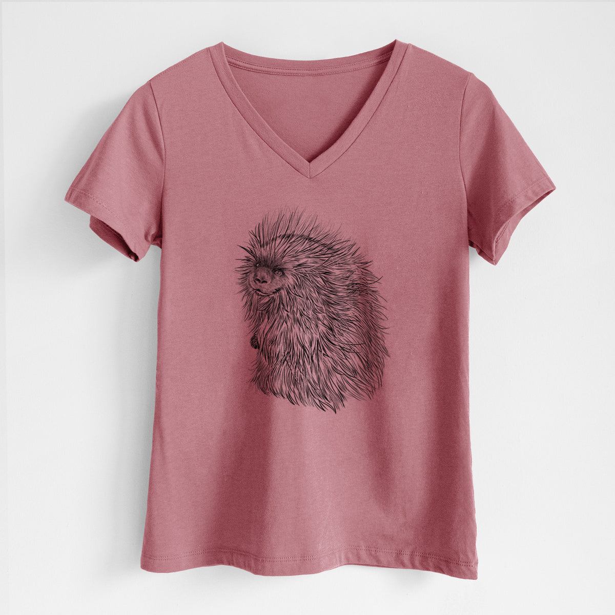 Mauve pink women's relaxed fit cotton V-neck t-shirt laid flat, printed with a detailed black ink illustration of a porcupine with its quills raised.