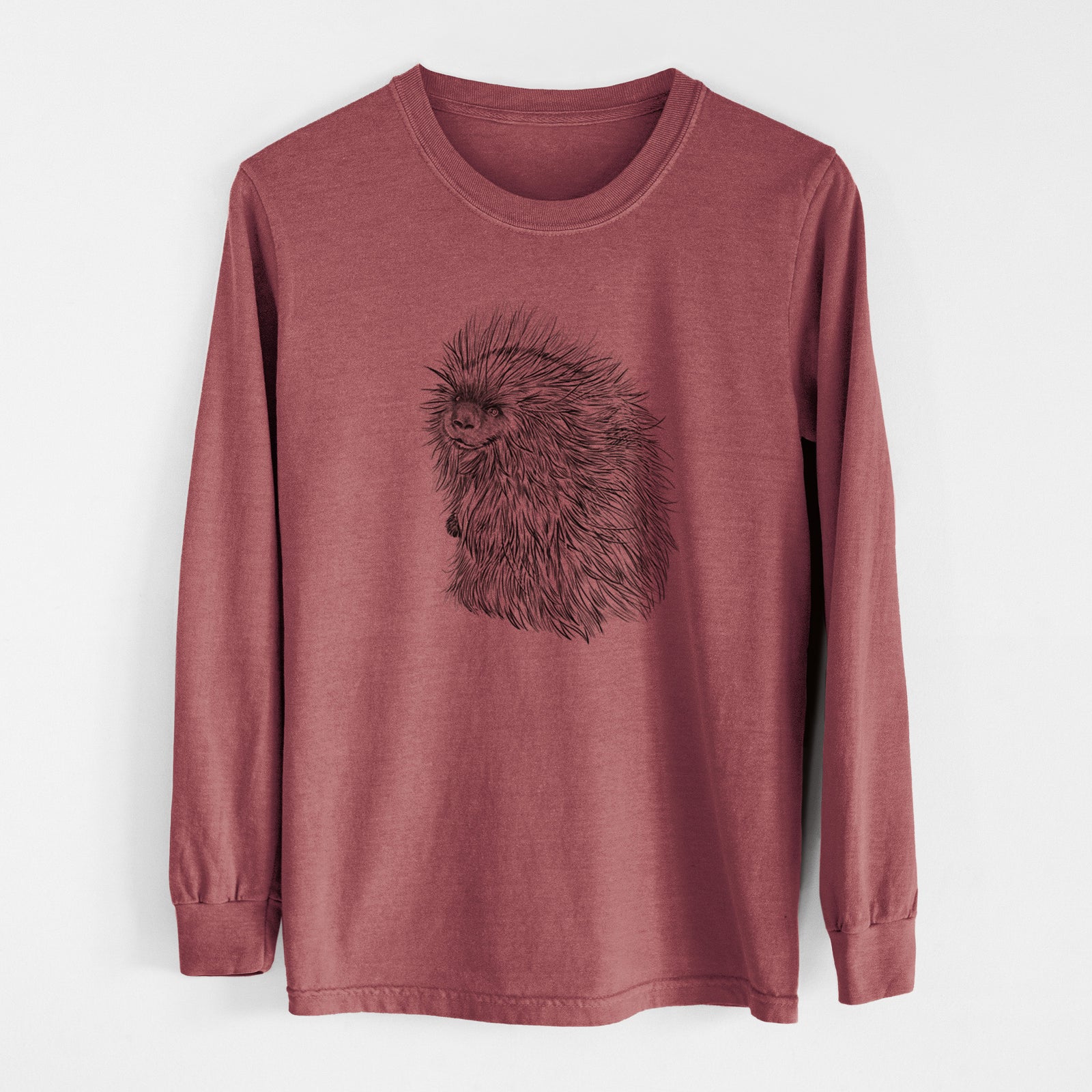 Ivory Comfort Colors long sleeve shirt laid flat, printed with a detailed black ink illustration of a porcupine with its quills raised.